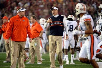 PASADENA, CA - JANUARY 06:  Auburn Tigers head coach Gus Malzahn stands on the field during the 2014 Vizio BCS National Championship Game against the Florida State Seminoles at the Rose Bowl on January 6, 2014 in Pasadena, California.  (Photo by Harry How