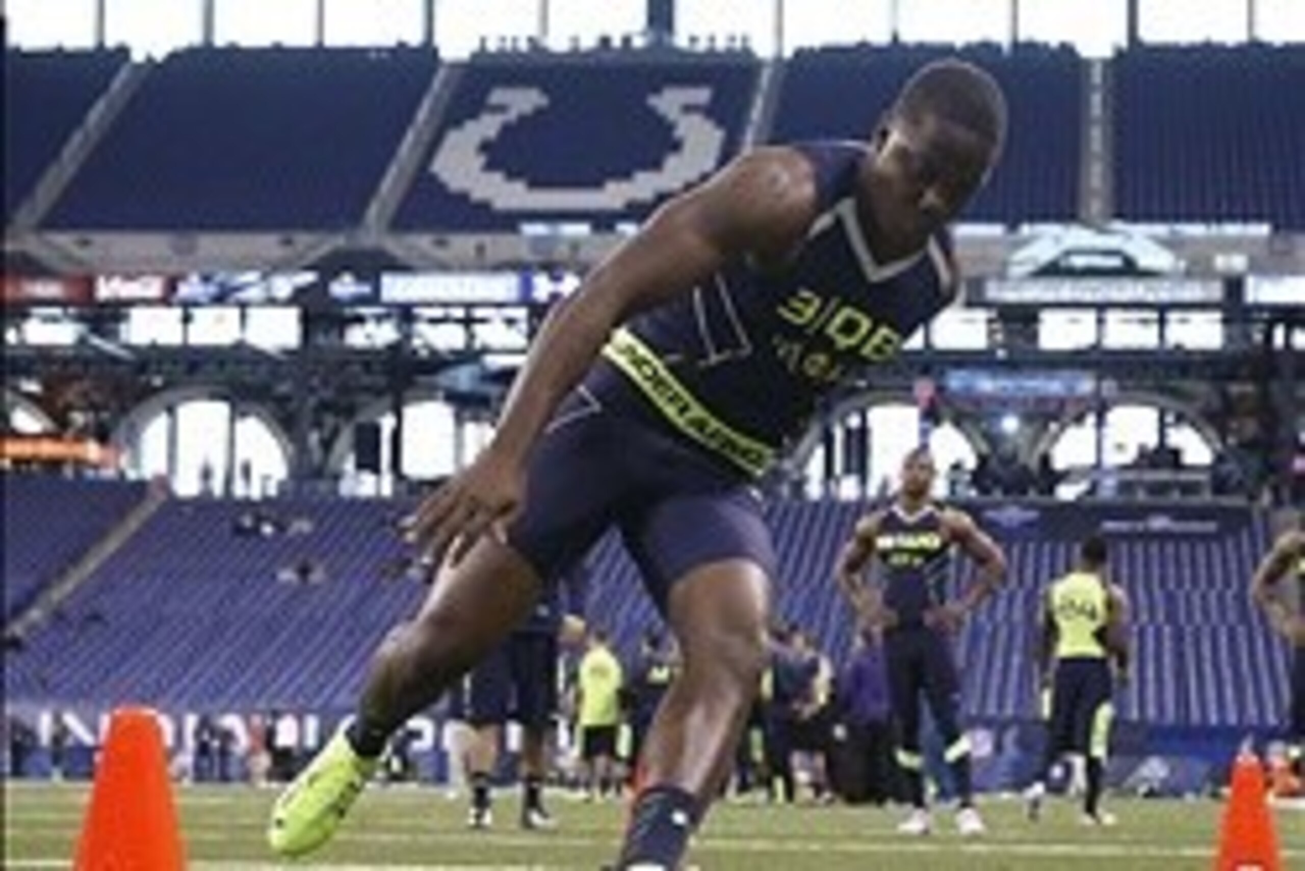 Feb 23, 2014; Indianapolis, IN, USA; Louisville Cardinals quarterback Teddy Bridgewater runs the shuttle dash during the 2014 NFL Combine at Lucas Oil Stadium. Mandatory Credit: Brian Spurlock-USA TODAY Sports
