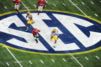 ATLANTA, GA - DECEMBER 3: Tyrann Mathieu #7 of the LSU Tigers returns a punt against the Georgia Bulldogs during the SEC Championship Game at the Georgia Dome on December 3, 2011 in Atlanta, Georgia. (Photo by Scott Cunningham/Getty Images)