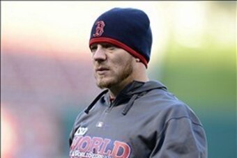 Oct 25, 2013; St. Louis, MO, USA; Boston Red Sox starting pitcher Jake Peavy (44) looks on during workouts a day before game three of the World Series against the St. Louis Cardinals at Busch Stadium. Mandatory Credit: Jeff Curry-USA TODAY Sports