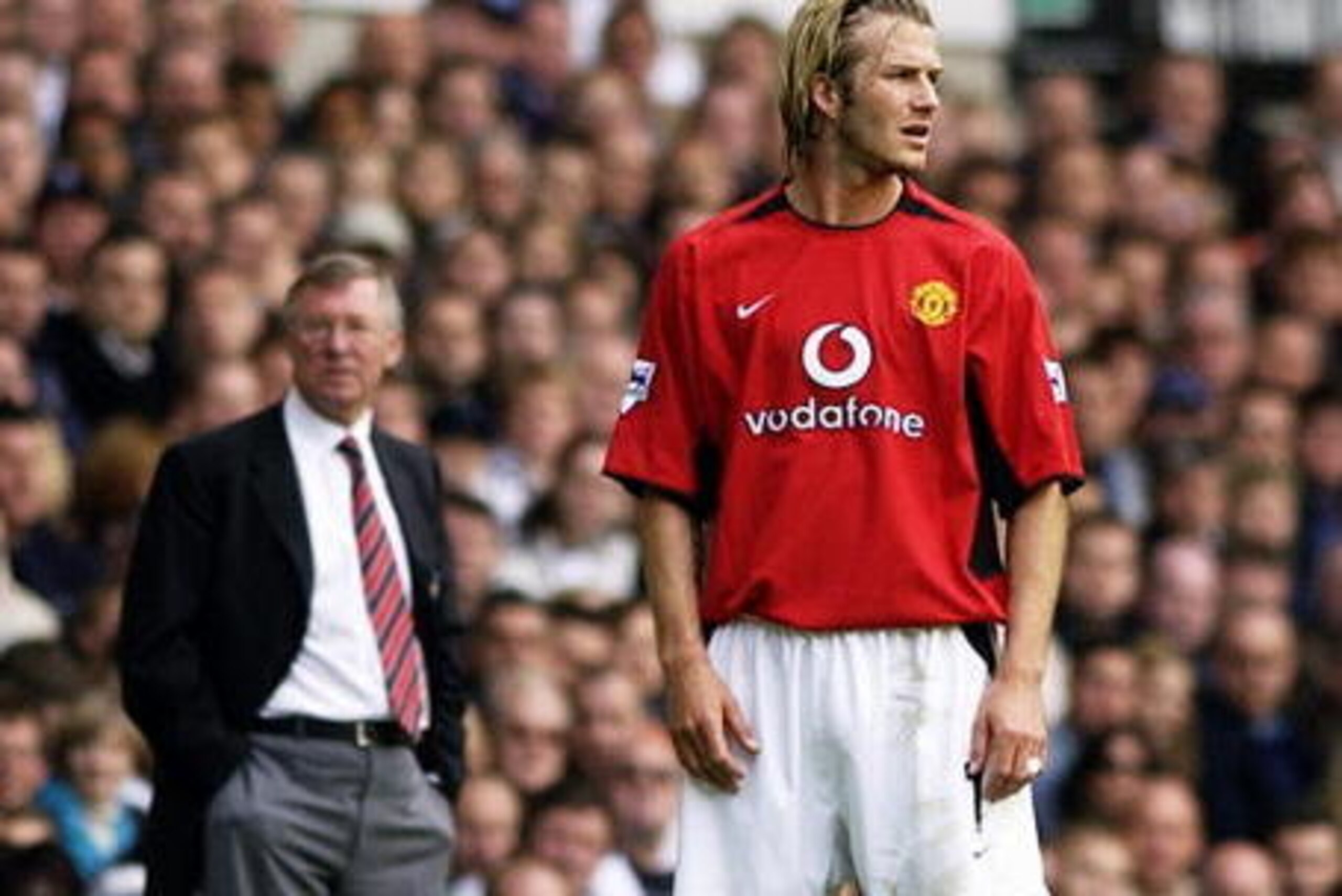 LONDON - APRIL 27:  David Beckham of Manchester United and his manager Sir Alex Ferguson look in different directions during the FA Barclaycard Premiership match between Tottenham Hotspur and Manchester United held on April 27, 2003 at White Hart Lane, in