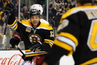 BOSTON, MA - FEBRUARY 8: Jarome Iginla #12 of the Boston Bruins celebrates a goal against the Ottawa Senators at the TD Garden on February 8, 2014 in Boston, Massachusetts.  (Photo by Brian Babineau/NHLI via Getty Images)