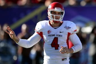 LAS VEGAS, NV - DECEMBER 21:  Quarterback Derek Carr #4 of the Fresno State Bulldogs signals teammates during the team's game against the USC Trojans in the Royal Purple Las Vegas Bowl at Sam Boyd Stadium on December 21, 2013 in Las Vegas, Nevada. USC won
