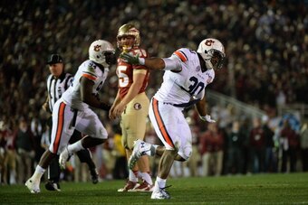 PASADENA, CA - JANUARY 06:  Defensive end Dee Ford #30 of the Auburn Tigers reacts to a play against the Florida State Seminoles during the 2014 Vizio BCS National Championship Game at the Rose Bowl on January 6, 2014 in Pasadena, California.  (Photo by H