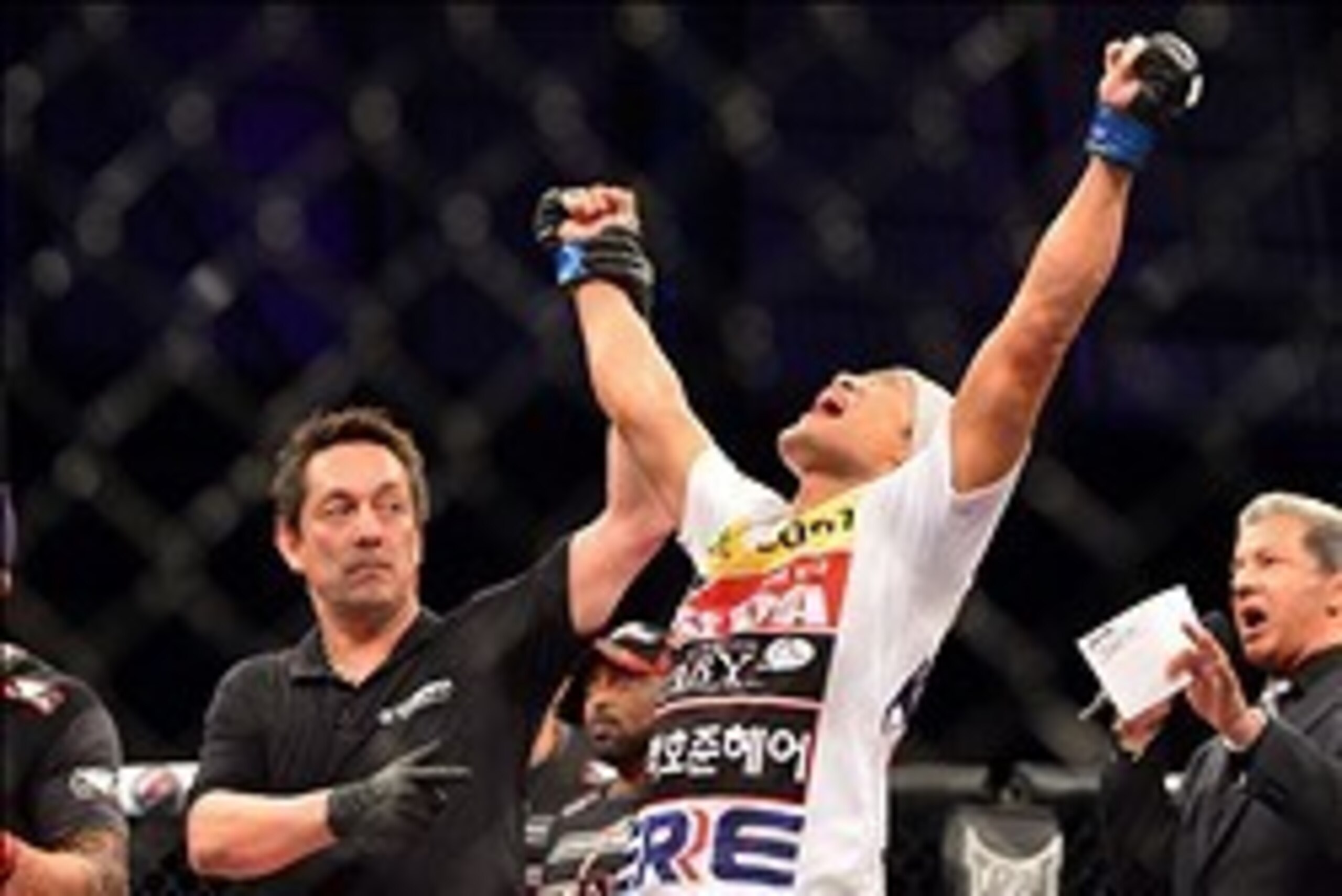 Oct 9, 2013; Barueri, Sao Paulo, Brazil; Dong Hyun Kim (red shorts) reacts after defeating Erick Silva (not pictured) during UFC Fight Night 29 at Jose Correa Arena. Mandatory Credit: Jason Silva-USA TODAY Sports