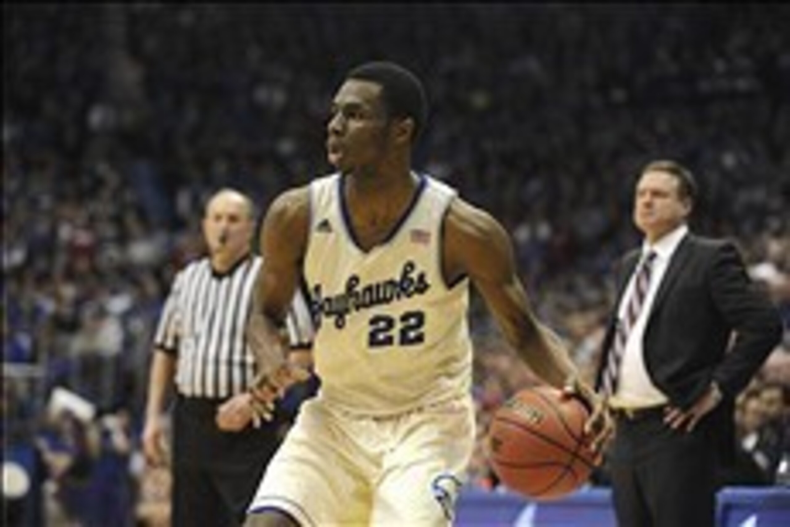 Feb 15, 2014; Lawrence, KS, USA; Kansas Jayhawks guard Andrew Wiggins (22) moves the ball against the TCU Horned Frogs in the second half at Allen Fieldhouse. Kansas won the game 95-65. Mandatory Credit: John Rieger-USA TODAY Sports