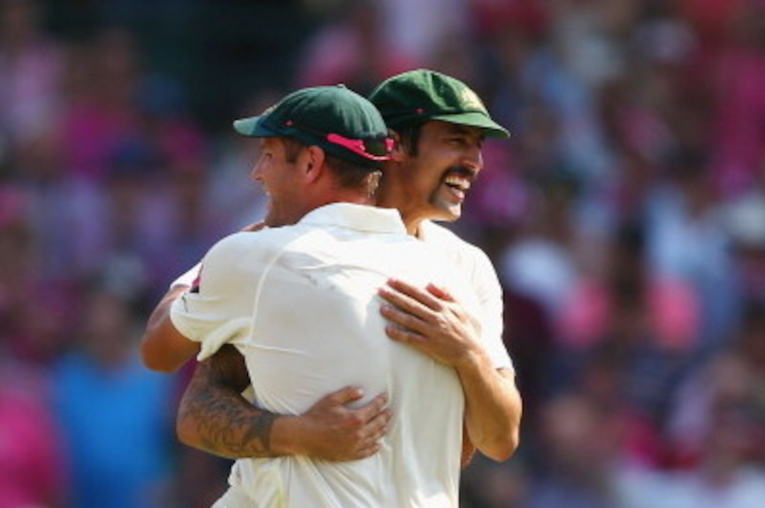 SYDNEY, AUSTRALIA - JANUARY 05: Ryan Harris and Mitchell Johnson of Australia embrace after winning the Ashes series 5-0 during day three of the Fifth Ashes Test match between Australia and England at Sydney Cricket Ground on January 5, 2014 in Sydney, Au