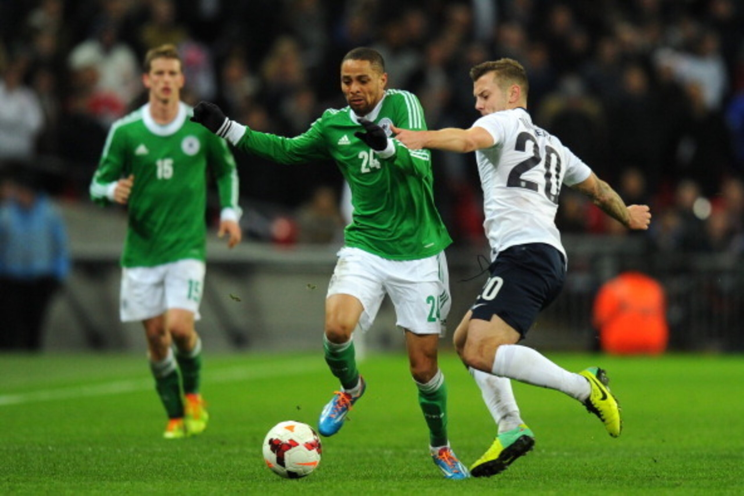 LONDON, ENGLAND - NOVEMBER 19:  Sidney Sam of Germany takes on Jack Wilshere of England during the international friendly match between England and Germany at Wembley Stadium on November 19, 2013 in London, England.  (Photo by Mike Hewitt/Getty Images)