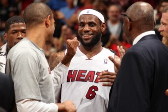 MIAMI, FL - March 3: LeBron James #6 of the Miami Heat celebrates after the game against the Charlotte Bobcats at the American Airlines Arena in Miami, Florida on Mar. 3, 2014. NOTE TO USER: User expressly acknowledges and agrees that, by downloading and/