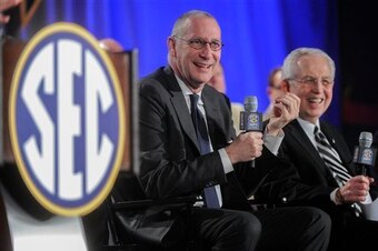 ESPN president John Skipper (left) and SEC commissioner Mike Slive