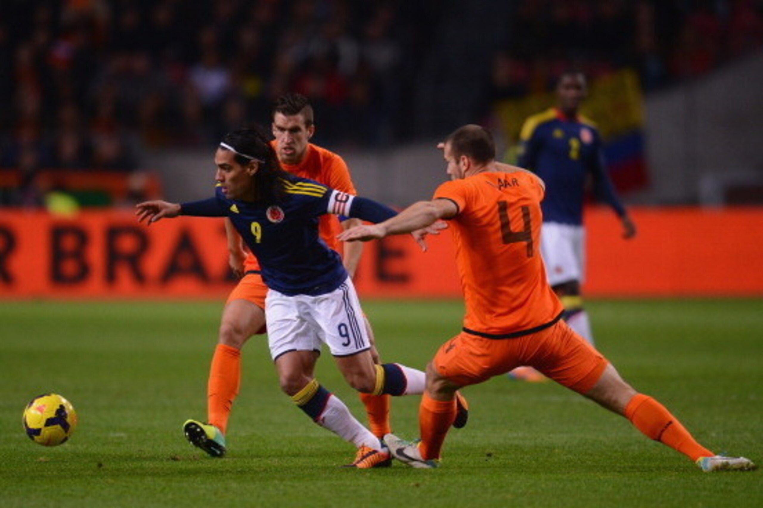 AMSTERDAM, NETHERLANDS - NOVEMBER 19:  Falcao of Colombia is challenged by Kevin Strootman and Ron Vlaar of Netherlands during the International Friendly match between Netherlands and Colombia at Amsterdam ArenA on November 19, 2013 in Amsterdam, Netherla