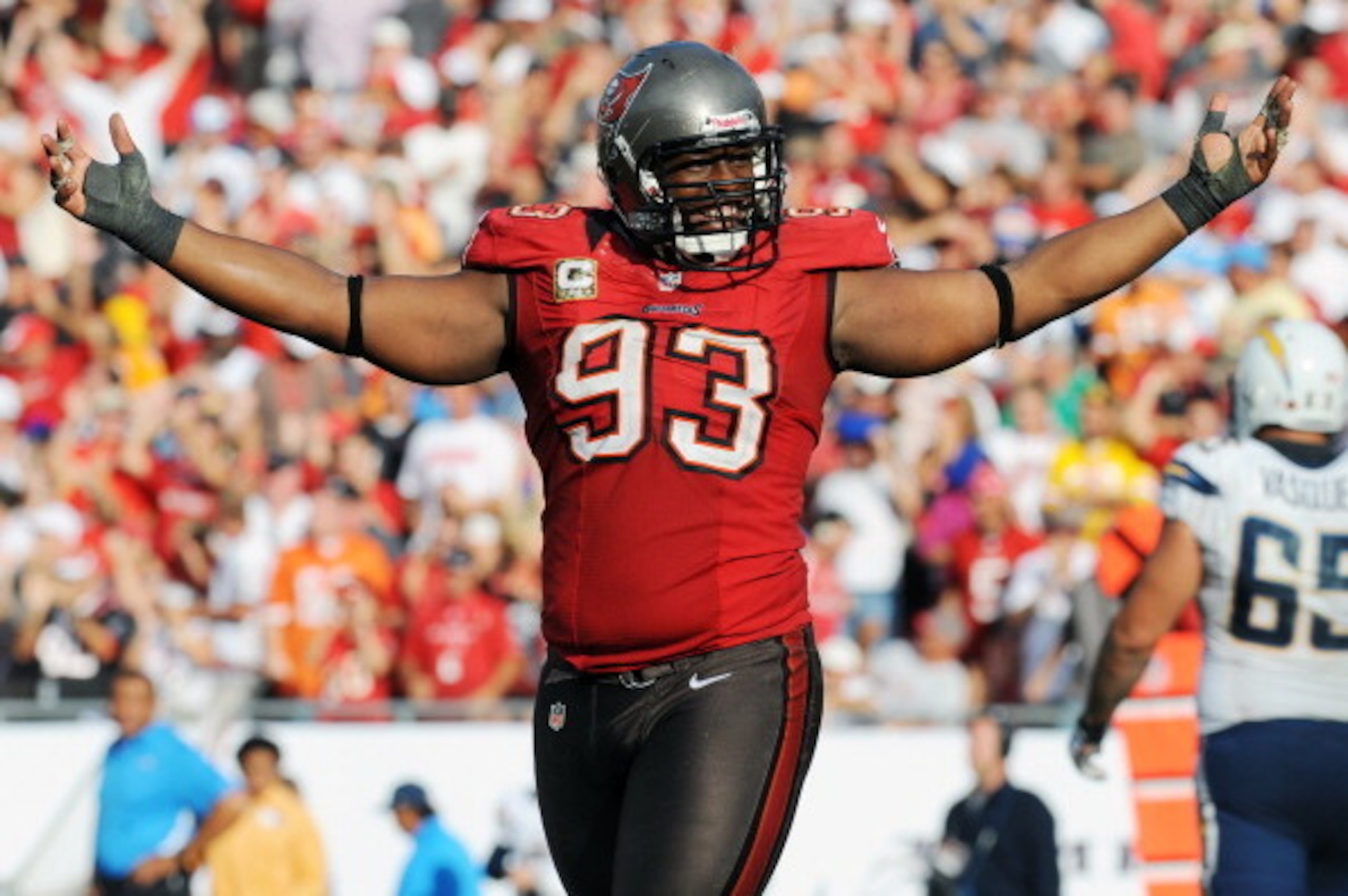 TAMPA, FL - NOVEMBER 11: Defensive tackle Gerald McCoy #93 of the Tampa Bay Buccaneers celebrates a 34 - 24 victory against the San Diego Chargers November 11, 2012 at Raymond James Stadium in Tampa, Florida. Tampa won 34 - 24. (Photo by Al Messerschmidt/