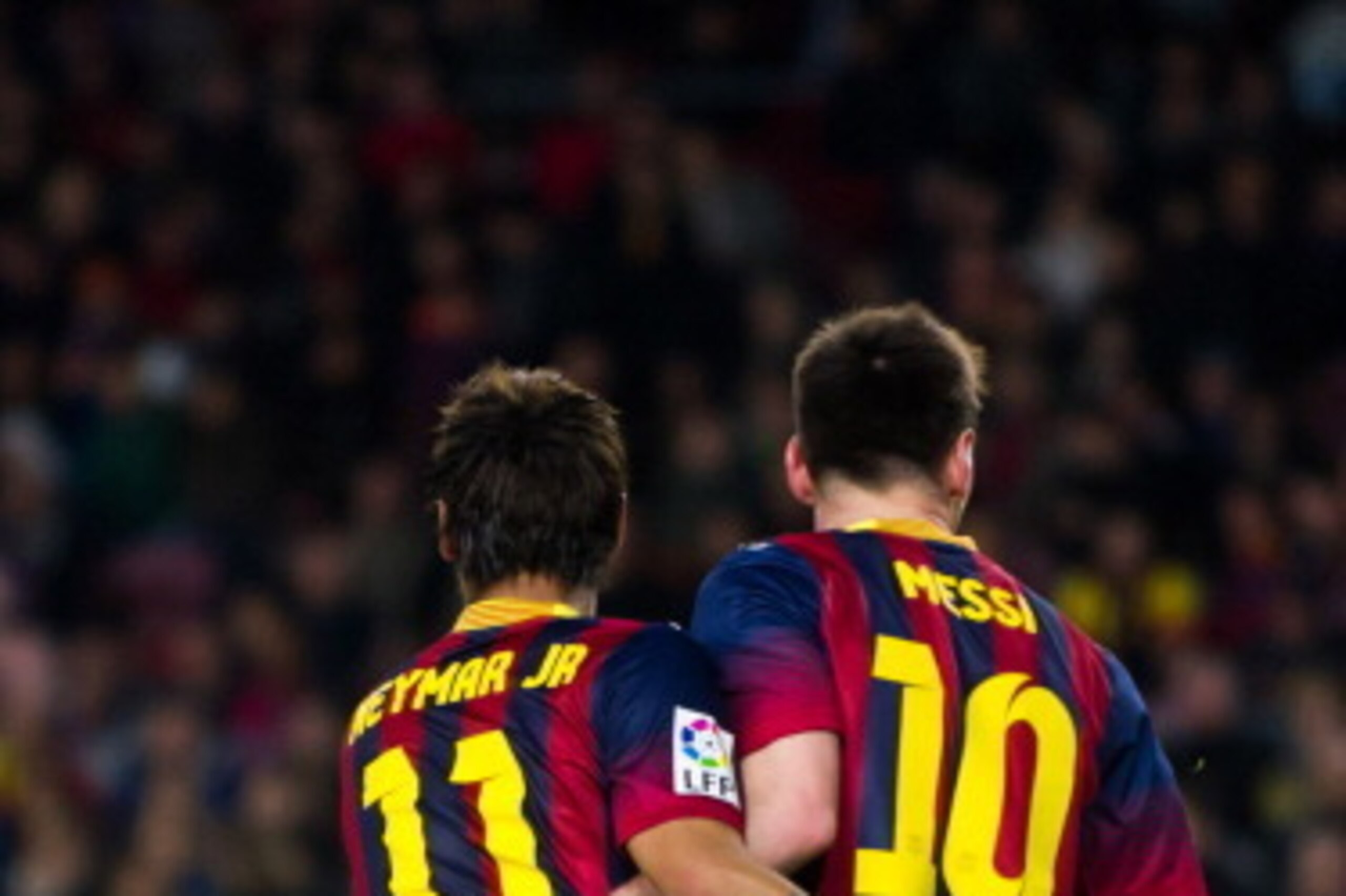 BARCELONA, SPAIN - MARCH 02: Neymar Santos Jr and Leo Messi of FC Barcelona pat each other on the back during the La Liga match between FC Barcelona and UD Almeria at Camp Nou on March 2, 2014 in Barcelona, Spain.  (Photo by Alex Caparros/Getty Images)
