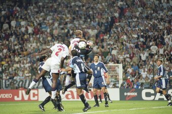 30 Jun 1998:  Sol Campbell (no.2) of England rises to head the ball into the back of the Argentina net, but the goal is disallowed for Alan Shearer's elbow on goalkeeper Carlos Roa during the World Cup second round match at the Stade Geoffroy Guichard inS
