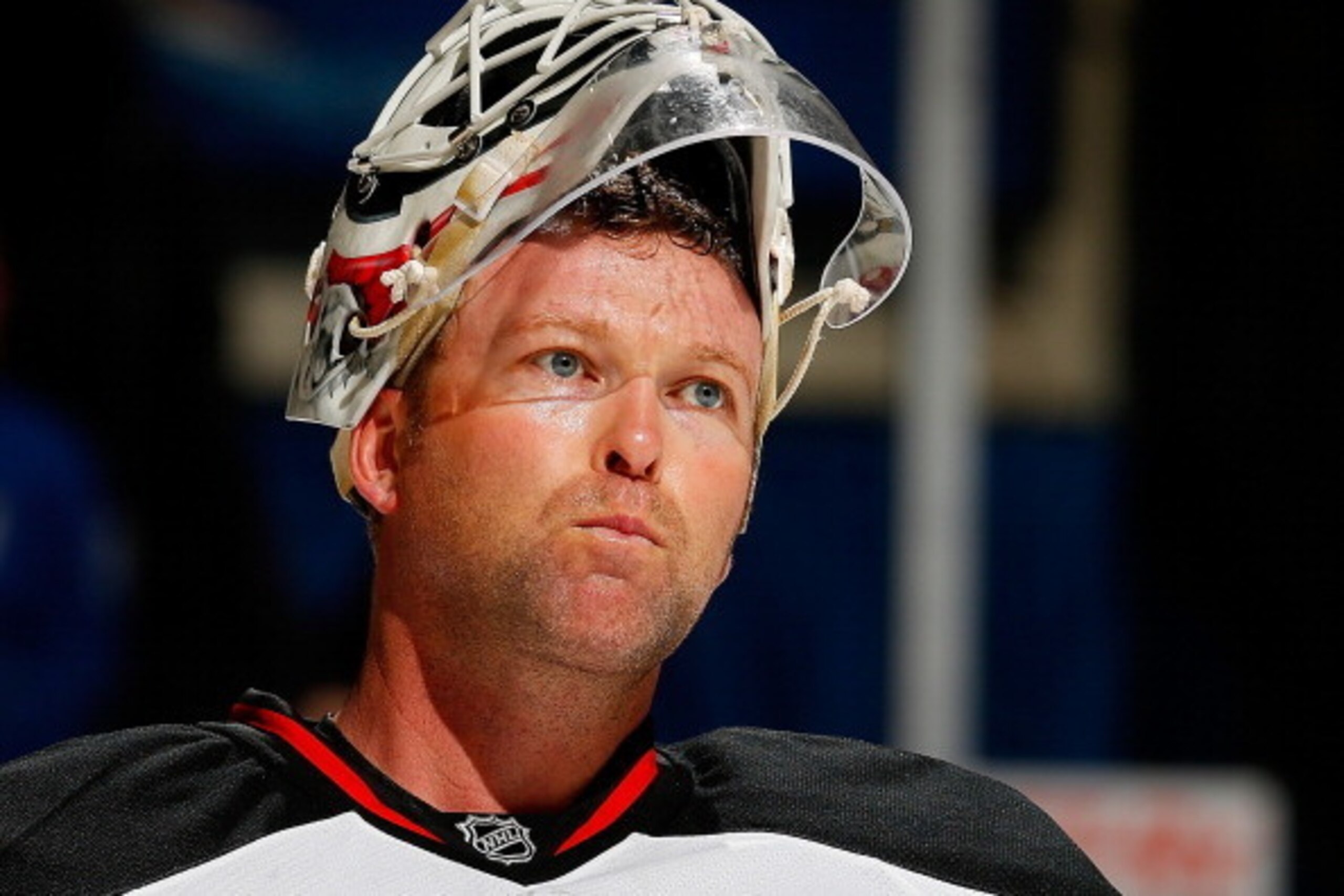 UNIONDALE, NY - MARCH 01: Martin Brodeur #30 of the New Jersey Devils looks ob during the game against the New York Islanders at Nassau Veterans Memorial Coliseum on March 1, 2014 in Uniondale, New York.  (Photo by Mike Stobe/NHLI via Getty Images)