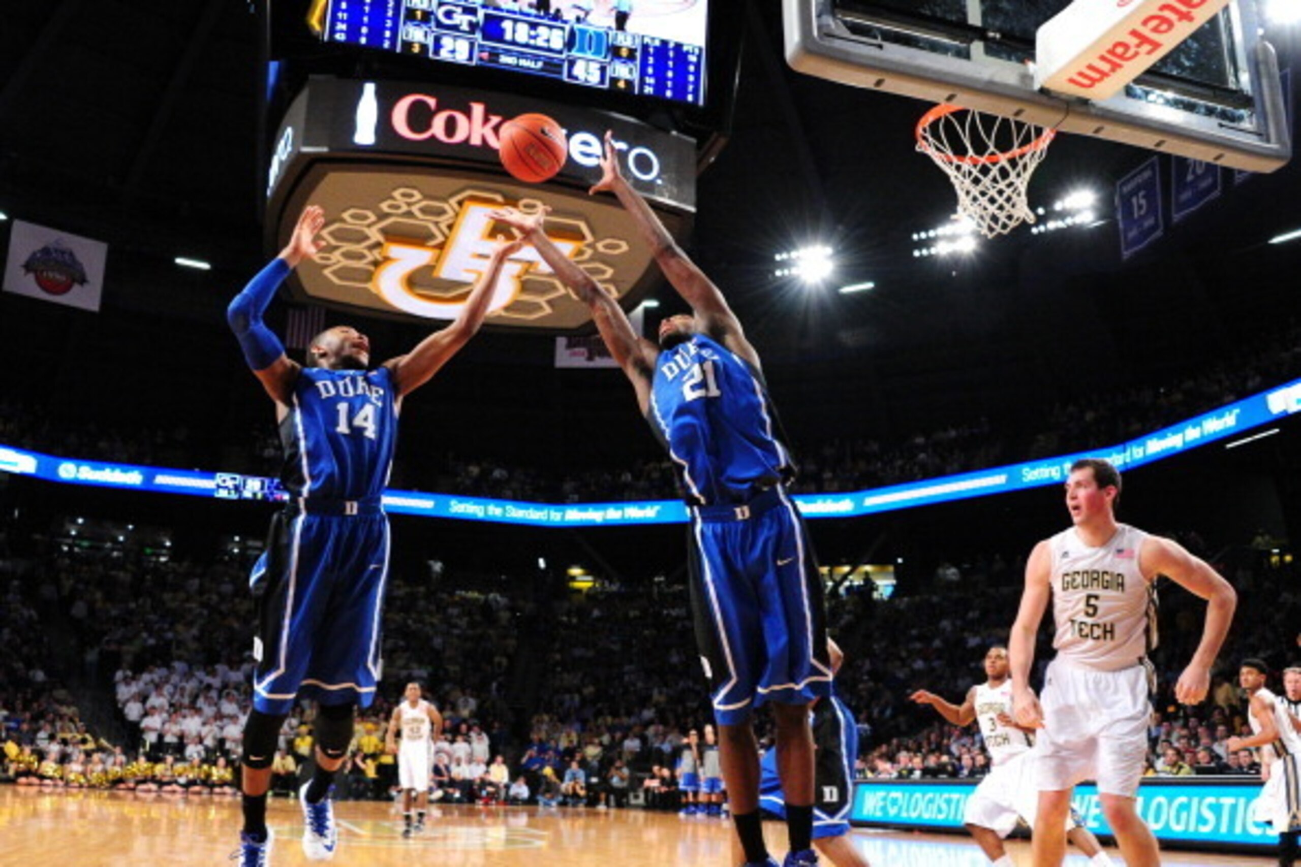 ATLANTA, GA - FEBRUARY 18: Rasheed Sulaimon #14 and Amile Jefferson #21 of the Duke Blue Devils go up for a rebound against the Georgia Tech Yellow Jackets at McCamish Pavilion on February 18, 2014 in Atlanta, Georgia. (Photo by Scott Cunningham/Getty Ima
