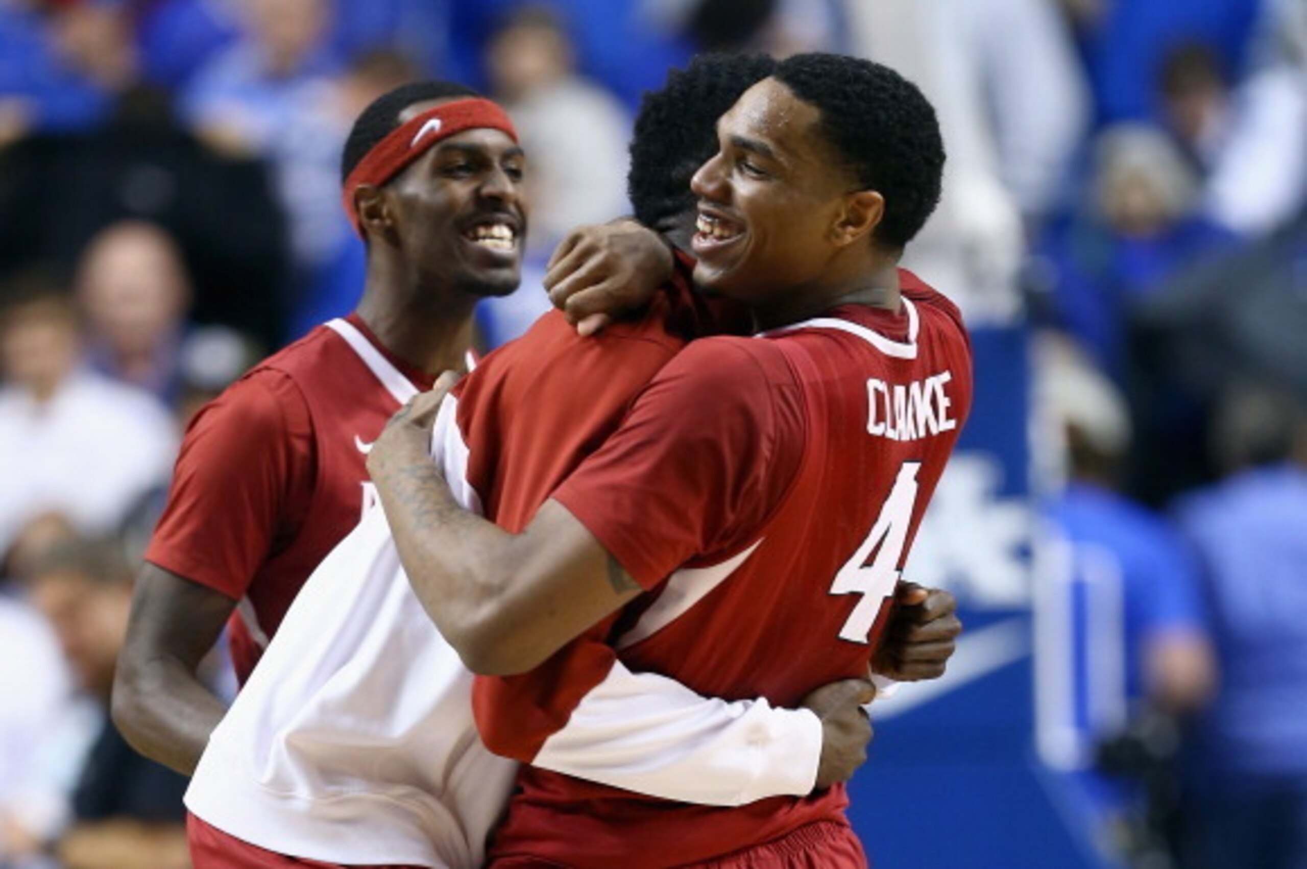 LEXINGTON, KY - FEBRUARY 27: Coty Clarke #4 of the Arkansas Razorbacks celebrates with a teammate after the 71-67 OT win over the Kentucky Wildcats at Rupp Arena on February 27, 2014 in Lexington, Kentucky. (Photo by Andy Lyons/Getty Images) LEXINGTON, KY - FEBRUARY 27: Coty Clarke #4 of the Arkansas Razorbacks celebrates with a teammate after the 71-67 OT win over the Kentucky Wildcats at Rupp Arena on February 27, 2014 in Lexington, Kentucky. (Photo by Andy Lyons/Getty Images)
