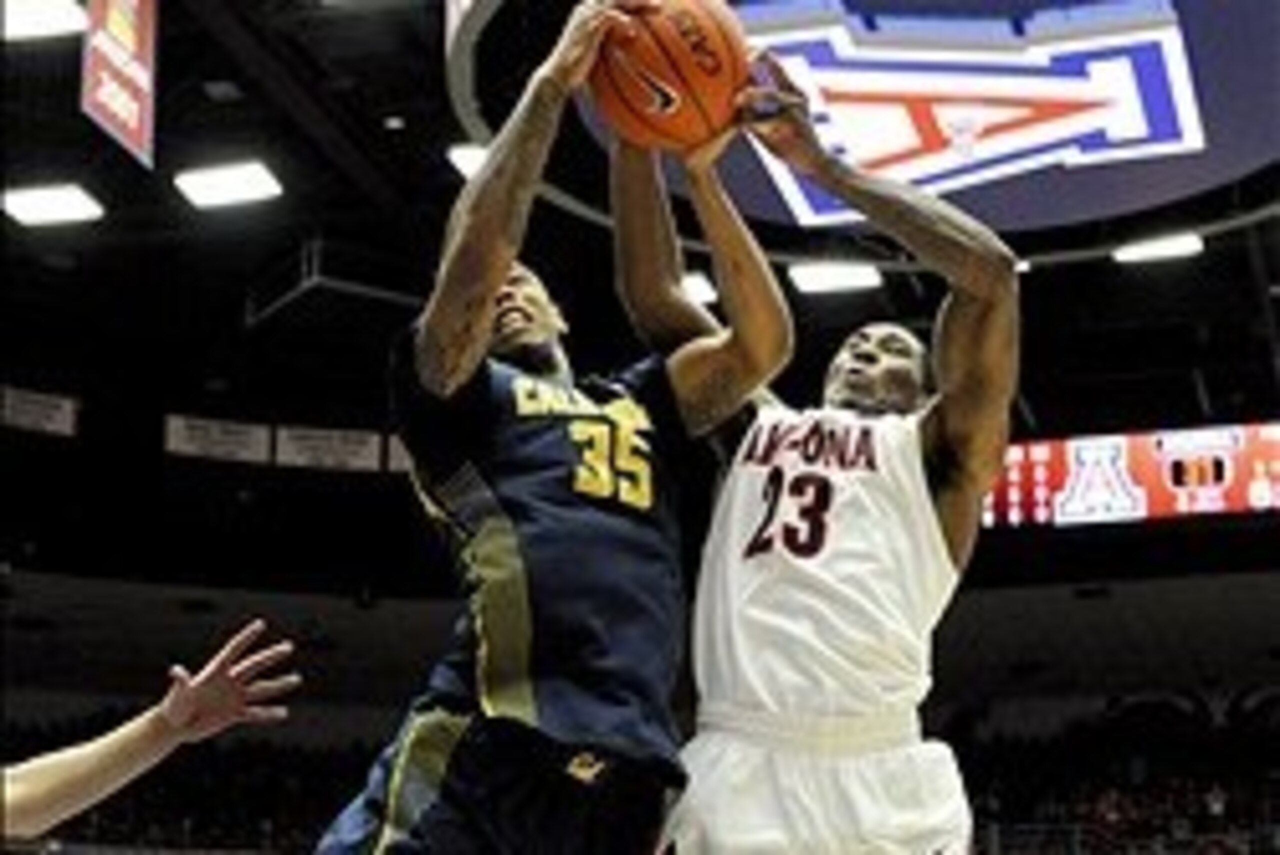 Feb 26, 2014; Tucson, AZ, USA; Arizona Wildcats forward Rondae Hollis-Jefferson (23) and California Golden Bears forward Richard Solomon (35) battle for the ball during the first half at McKale Center. Mandatory Credit: Casey Sapio-USA TODAY Sports Feb 26, 2014; Tucson, AZ, USA; Arizona Wildcats forward Rondae Hollis-Jefferson (23) and California Golden Bears forward Richard Solomon (35) battle for the ball during the first half at McKale Center. Mandatory Credit: Casey Sapio-USA TODAY Sports