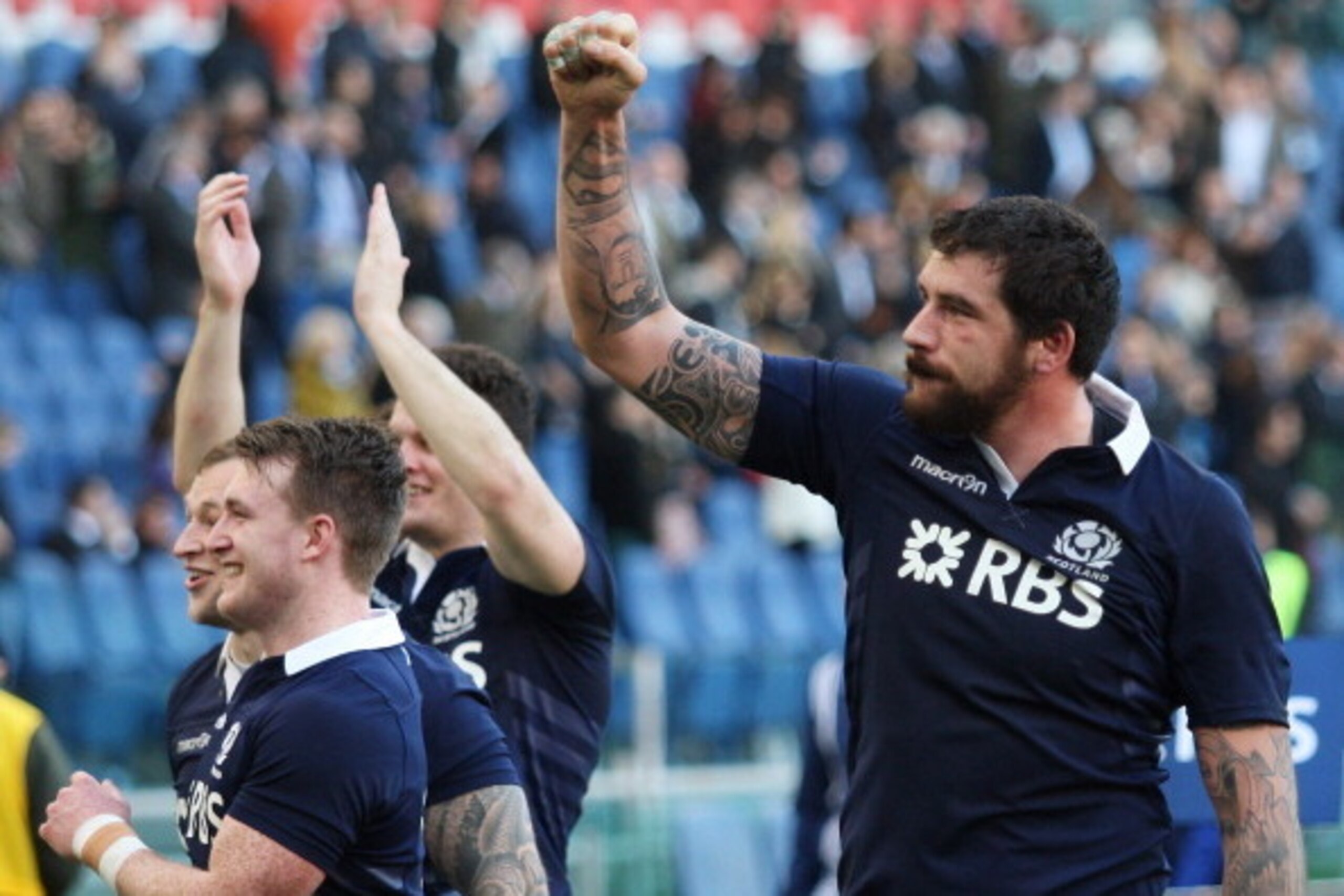 ROME, ITALY - FEBRUARY 22:  Jim Hamilton (R) with his teammates of Scotland celebrate the victory during the RBS Six Nations match between Italy and Scotland at Stadio Olimpico on February 22, 2014 in Rome, Italy.  (Photo by Paolo Bruno/Getty Images)