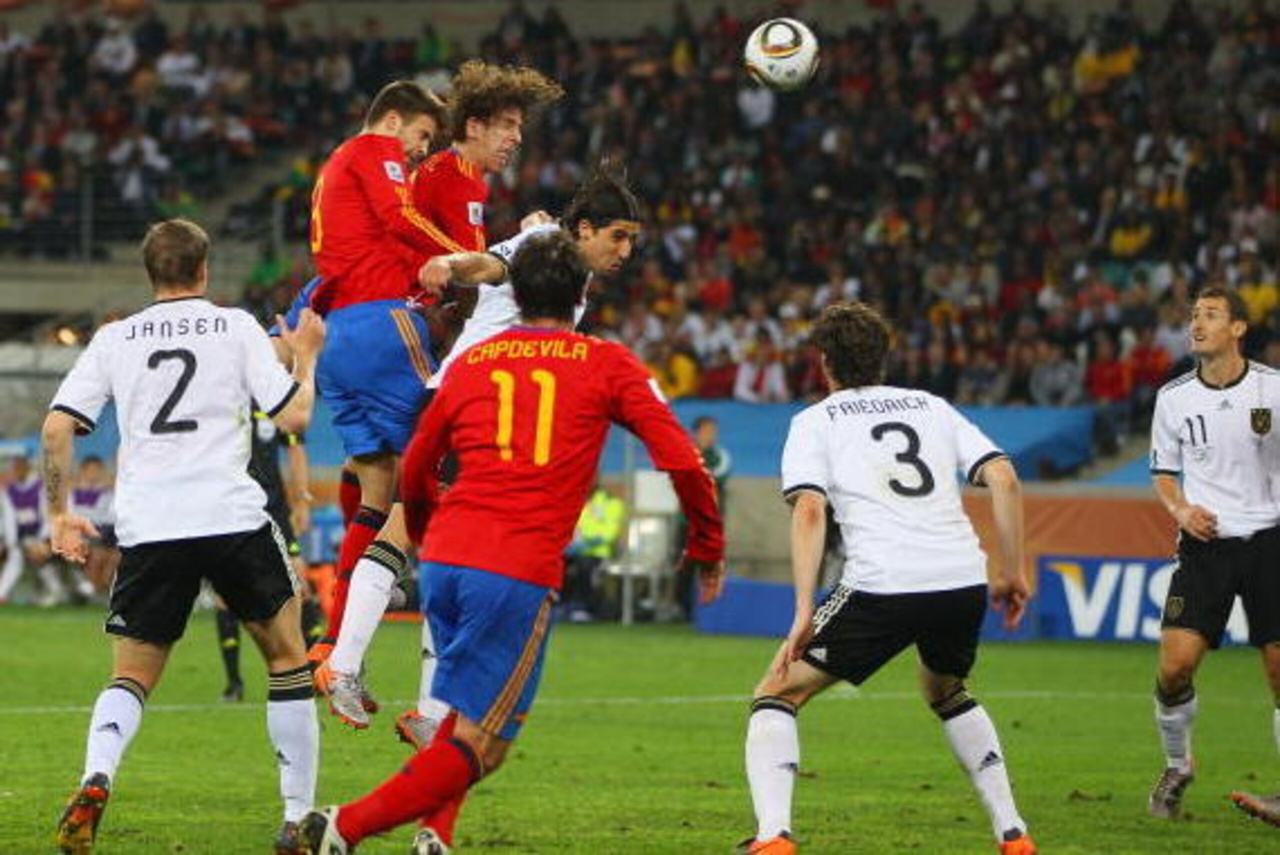 DURBAN, SOUTH AFRICA - JULY 07:  Carles Puyol of Spain scores the opening goal during the 2010 FIFA World Cup South Africa Semi Final match between Germany and Spain at Durban Stadium on July 7, 2010 in Durban, South Africa.  (Photo by Michael Steele/Gett