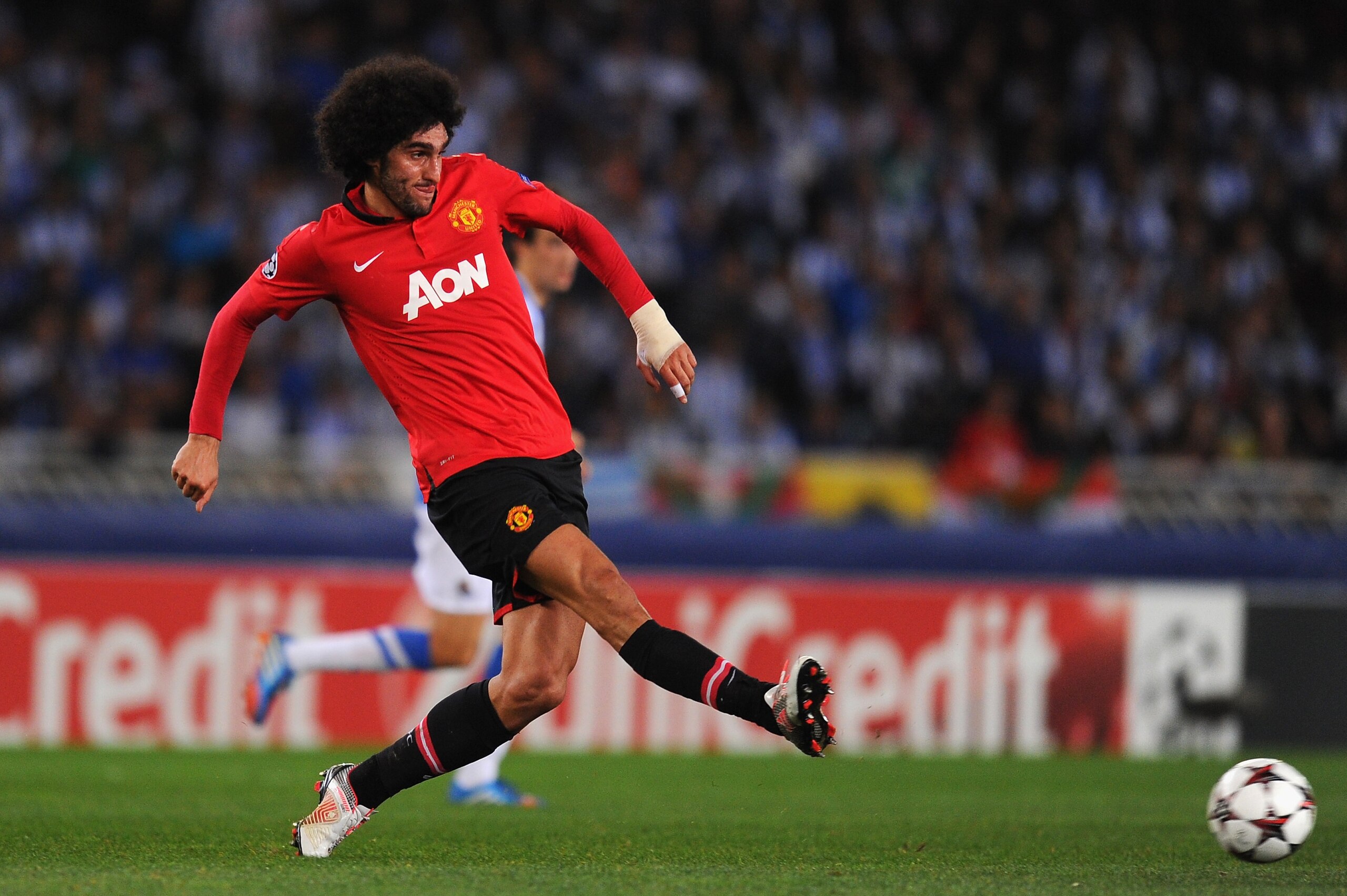 SAN SEBASTIAN, SPAIN - NOVEMBER 05:  Marouane Fellaini of Manchester United in action during the UEFA Champions League Group A match between Real Sociedad and Manchester United at Estadio Anoeta on November 5, 2013 in San Sebastian, Spain.  (Photo by Mike