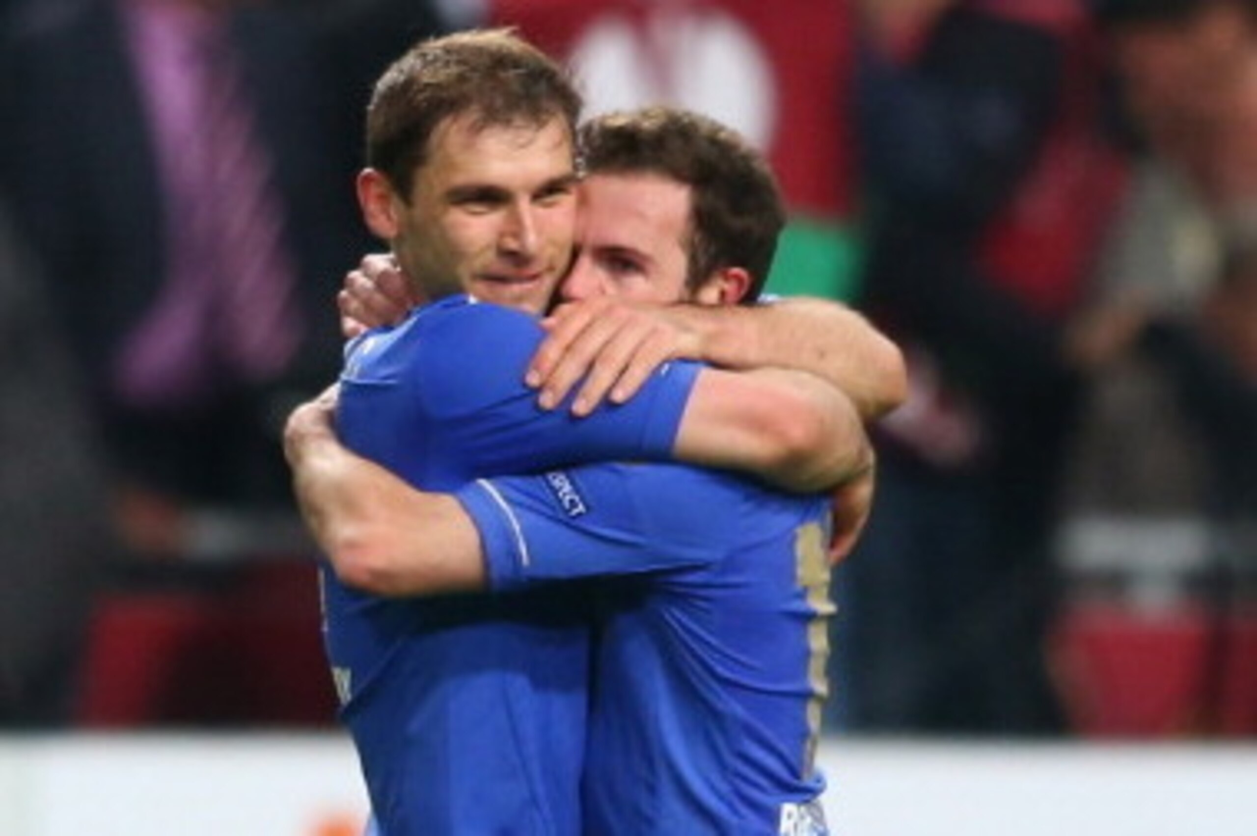 AMSTERDAM, NETHERLANDS - MAY 15:  Branislav Ivanovic of Chelsea celebrates with Juan Mata of Chelsea during the UEFA Europa League Final between SL Benfica and Chelsea FC at Amsterdam Arena on May 15, 2013 in Amsterdam, Netherlands.  (Photo by Michael Ste