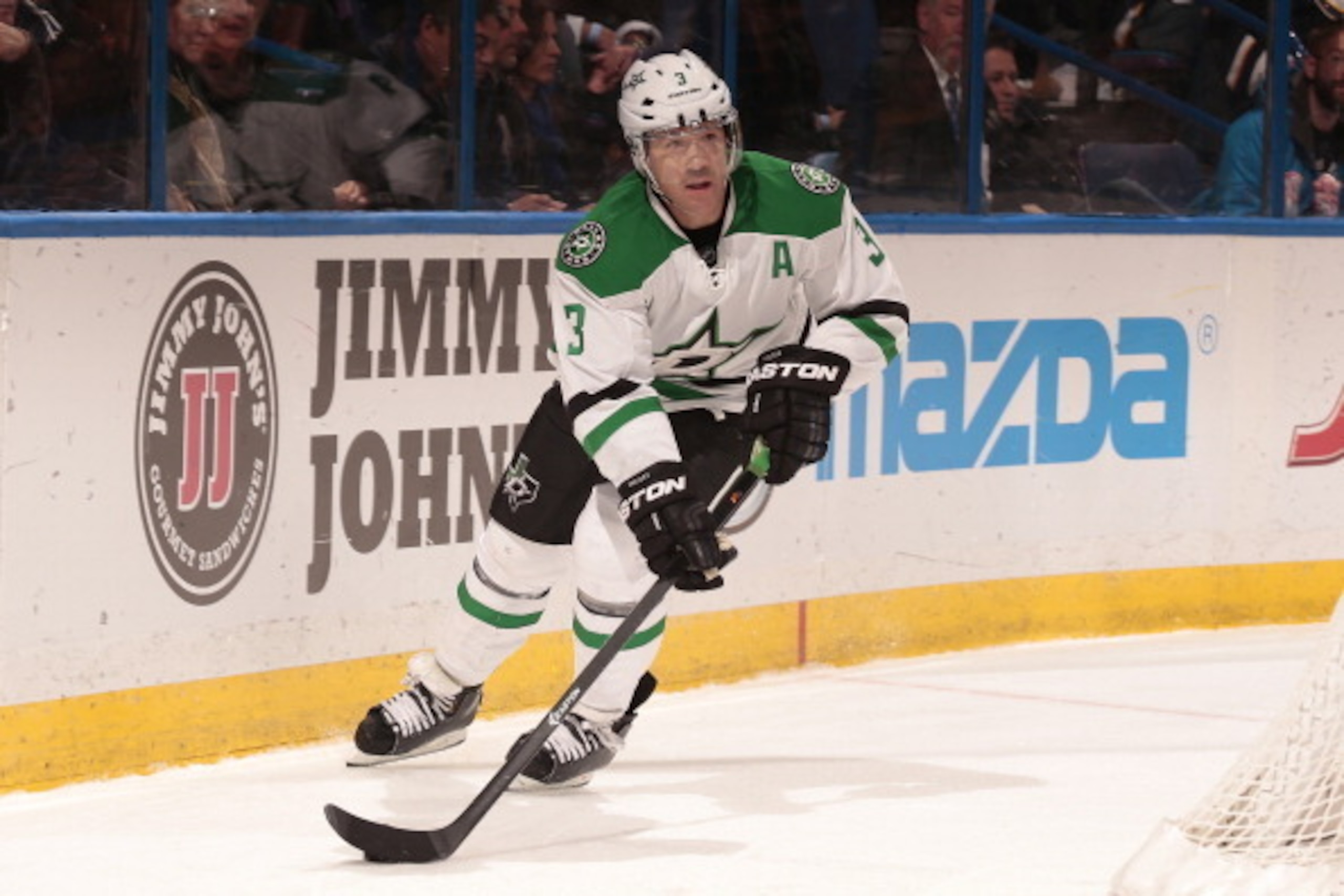 ST. LOUIS, MO - NOVEMBER 23:  Stephane Robidas #3 of the Dallas Stars skates the puck against the St. Louis Blues on November 23, 2013 at Scottrade Center in St. Louis, Missouri. (Photo by Mark Buckner/NHLI via Getty Images)