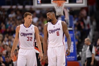 LOS ANGELES, CA - FEBRUARY 12: Blake Griffin #32 and DeAndre Jordan #6 of the Los Angeles Clippers look on during their game against the Portland Trail Blazers at Staples Center on February 12, 2014 in Los Angeles, California. NOTE TO USER: User expressly