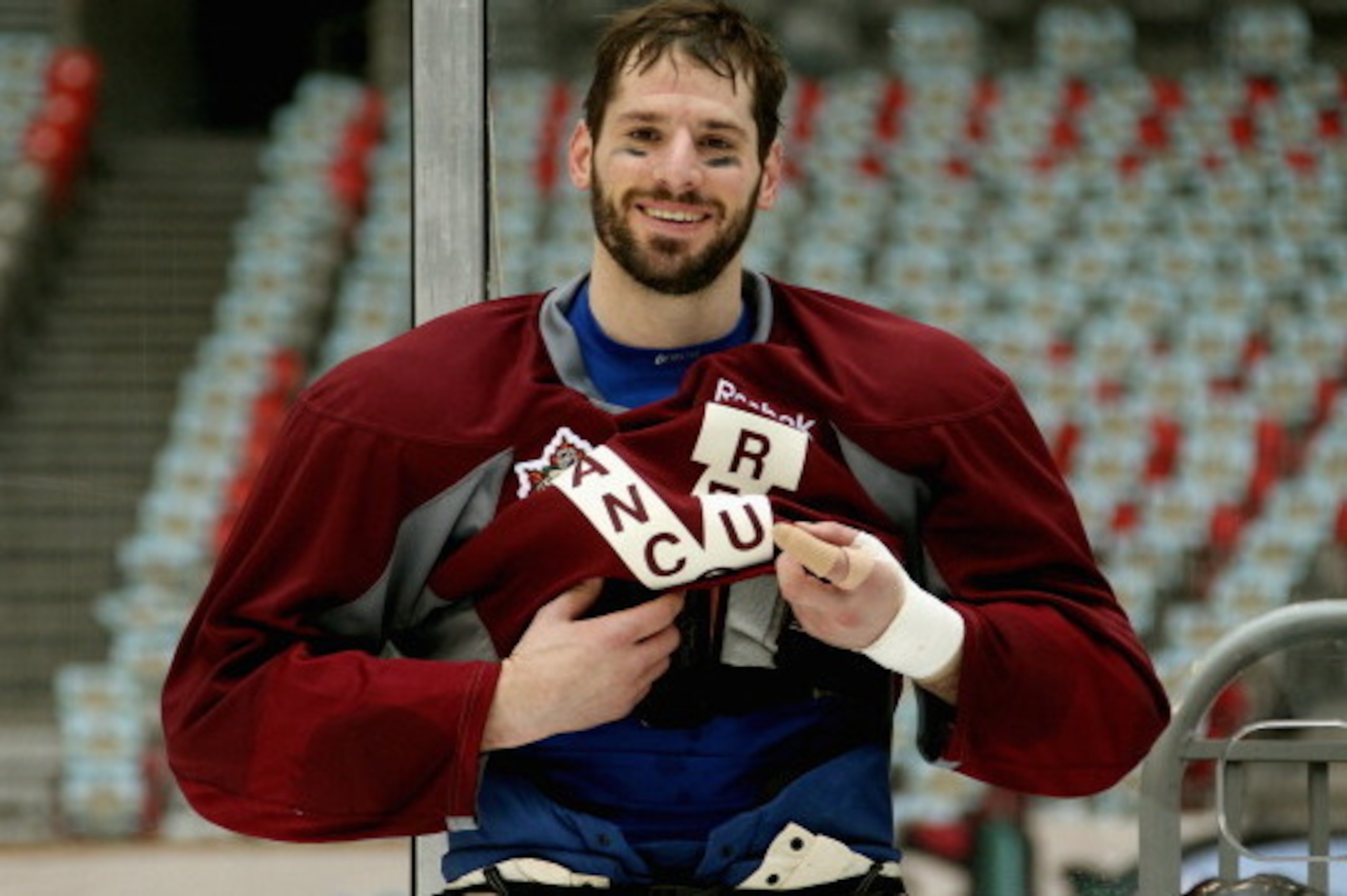 VANCOUVER, BC - MARCH 01:  (EDITORIAL USE ONLY) Ryan Kesler #17 of the Vancouver Canucks smiles during the family skate after practice for the 2014 Tim Hortons NHL Heritage Classic game at BC Place on March 1, 2014 in Vancouver, British Columbia, Canada. 
