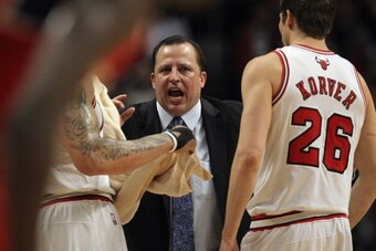 CHICAGO, IL - MAY 08: Head coach Tom Thibodeau of the Chicago Bulls gives instructions to Carlos Boozer #5 (L) and Kyle Korver #26 against the Philadelphia 76ers in Game Five of the Eastern Conference Quarterfinals during the 2012 NBA Playoffs at the Unit
