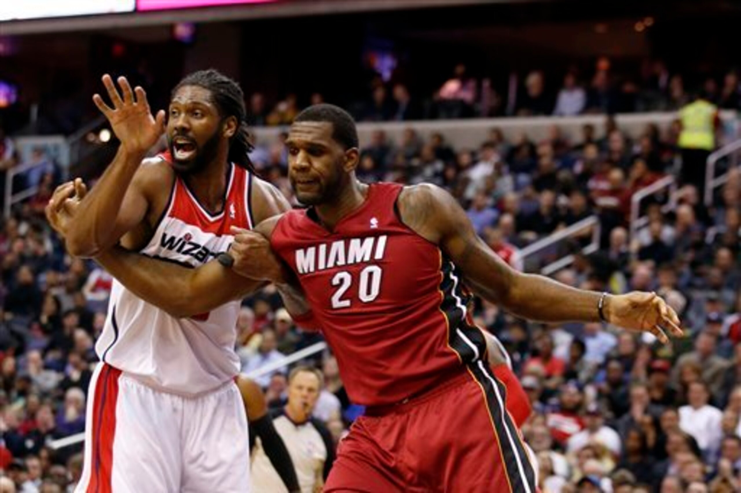 Oden, here battling Nene for post position, has made a difference for Miami in limited minutes.