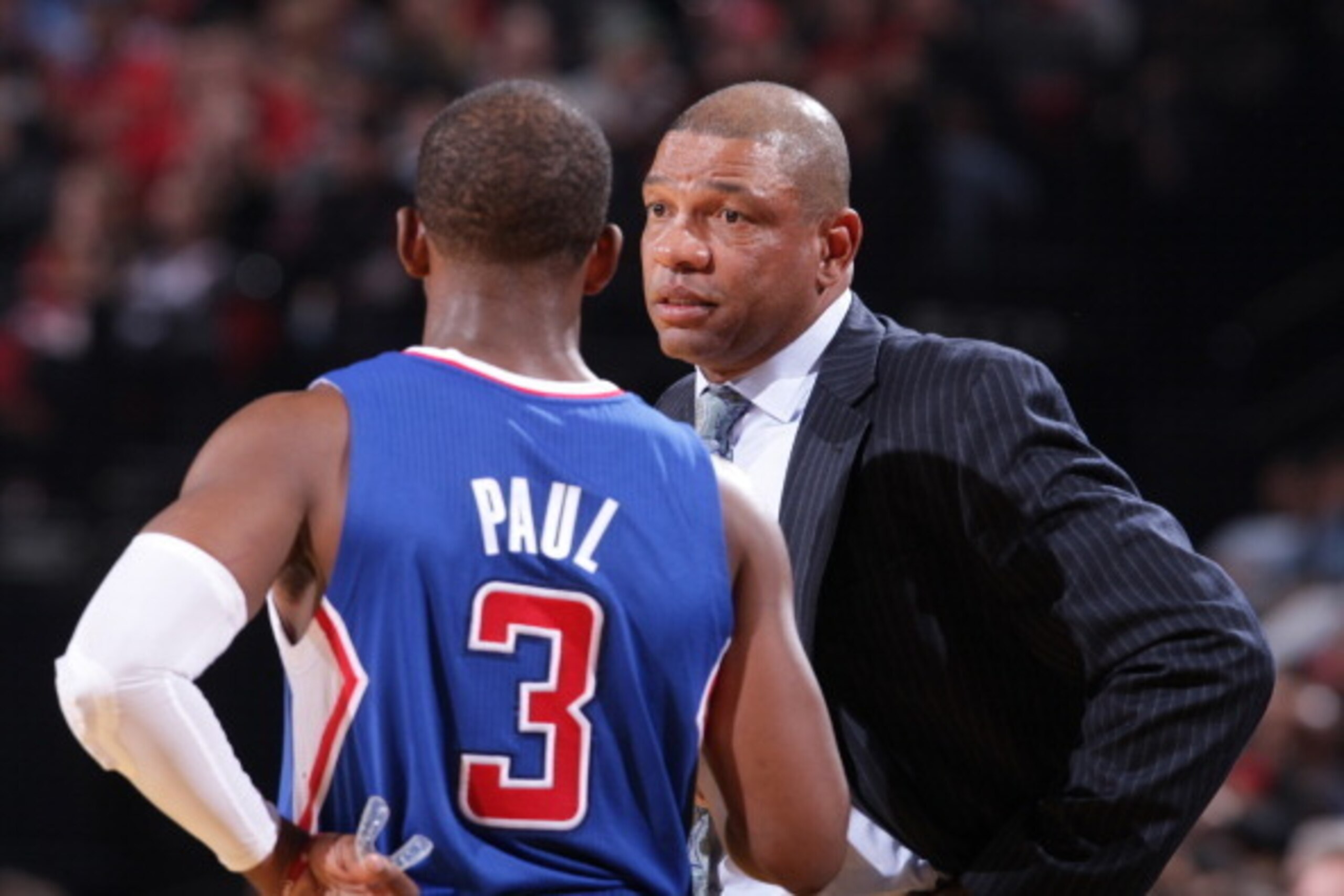 PORTLAND, OR - DECEMBER 26:  Chris Paul #3 talks to Doc Rivers of the Los Angeles Clippers during the game against the Portland Trail Blazers on December 26, 2013 at the Moda Center Arena in Portland, Oregon. NOTE TO USER: User expressly acknowledges and 