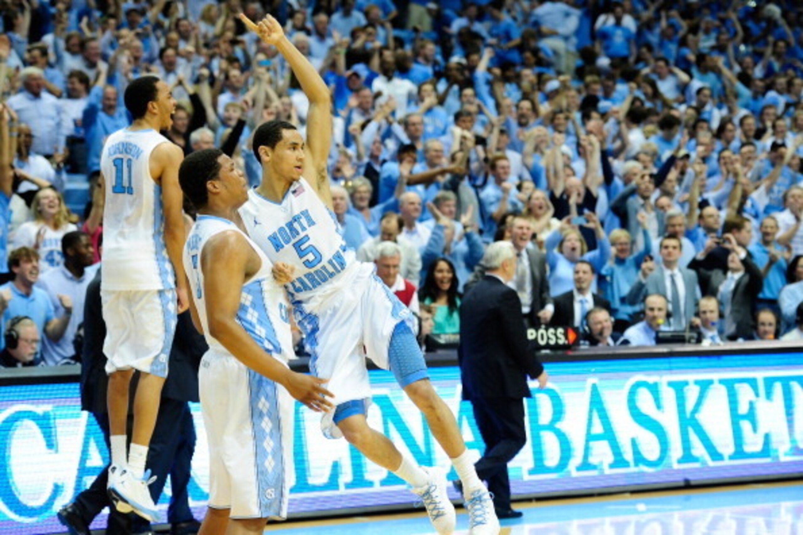 CHAPEL HILL, NC - FEBRUARY 20:  Kennedy Meeks #3 and Marcus Paige #5 of the North Carolina Tar Heels celebrate after a win over the Duke Blue Devils at the Dean Smith Center on February 20, 2014 in Chapel Hill, North Carolina. North Carolina won 74-66.  (