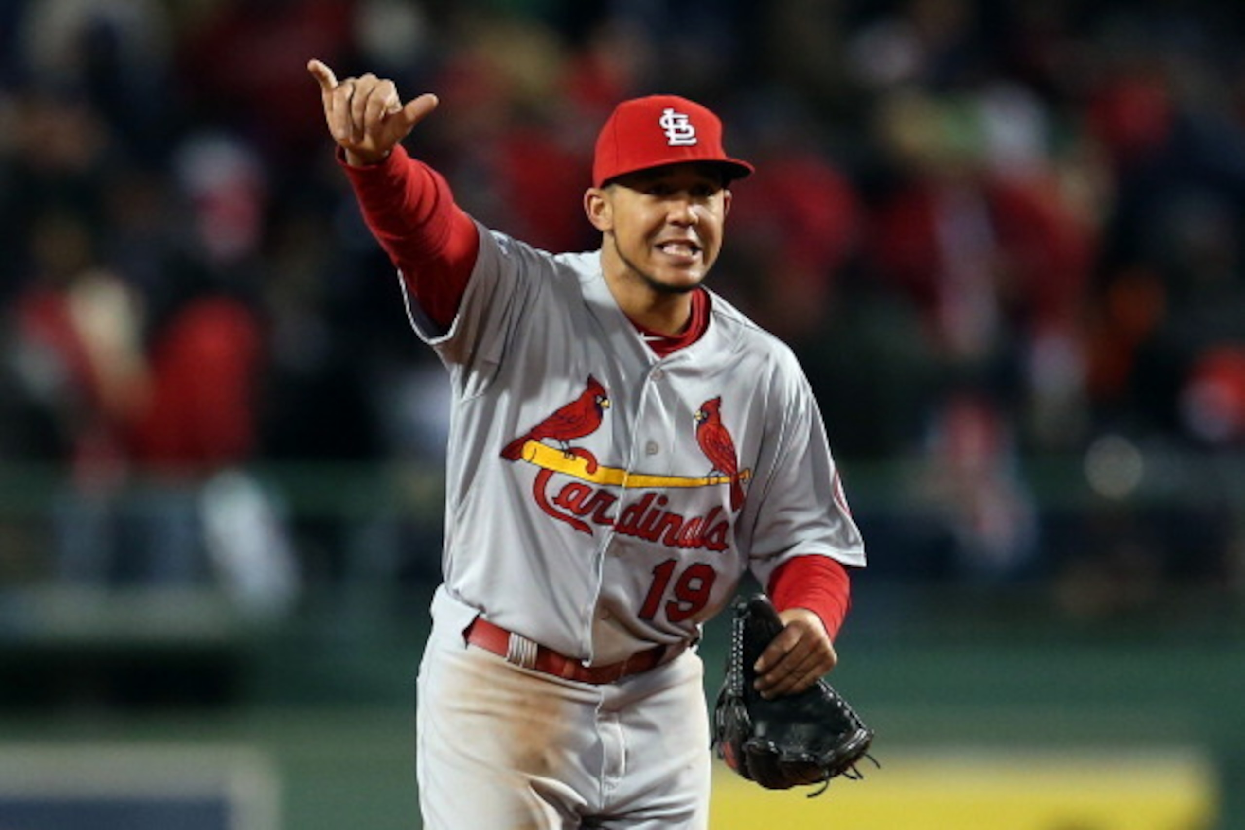 BOSTON, MA - OCTOBER 24:  Jon Jay #19 of the St. Louis Cardinals celebrates after defeating the Boston Red Sox 4-2 in Game Two of the 2013 World Series at Fenway Park on October 24, 2013 in Boston, Massachusetts.  (Photo by Rob Carr/Getty Images)