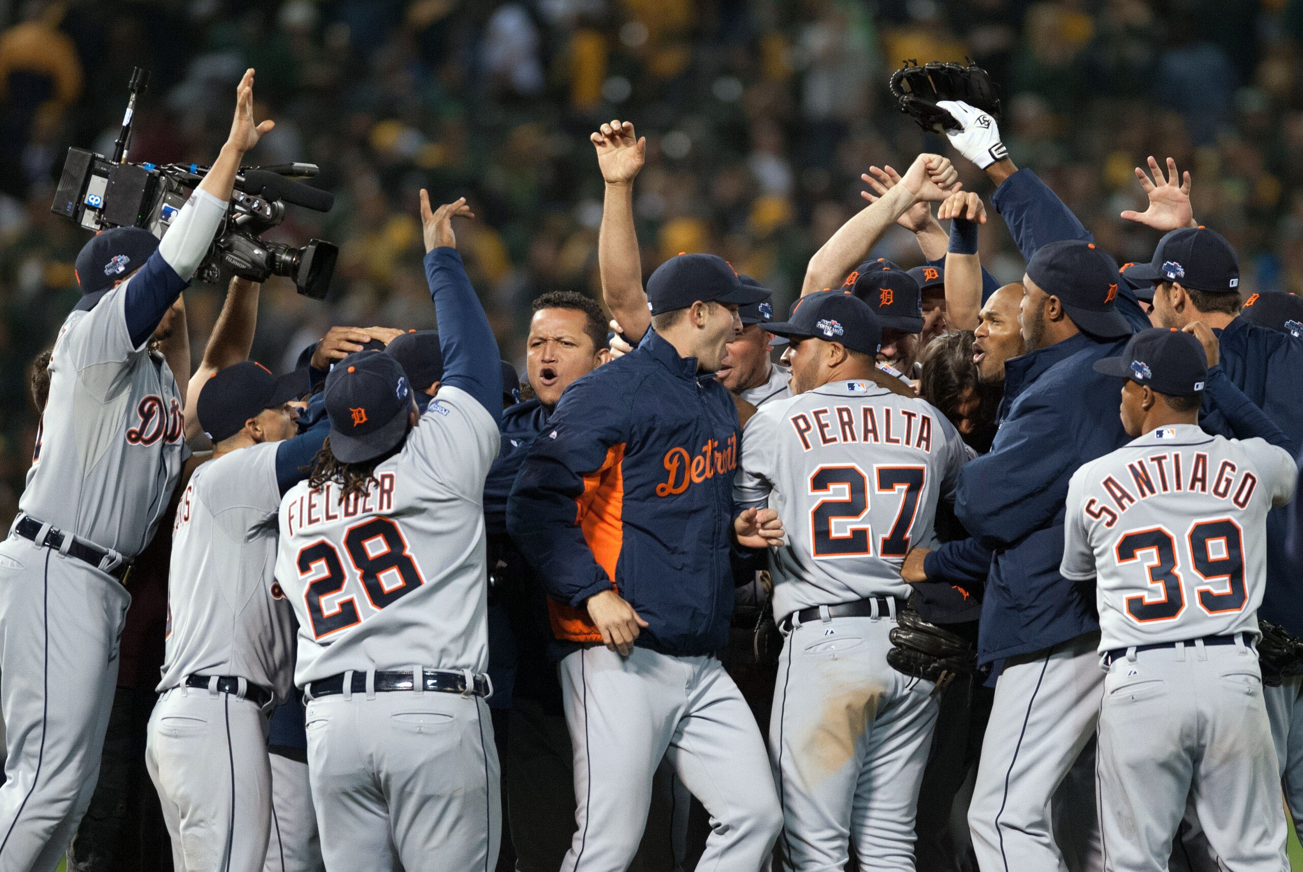 Oct 10, 2013; Oakland, CA, USA;  Detroit Tigers players celebrate their victory over the Oakland Athletics in game five of the American League divisional series playoff baseball game at O.co Coliseum. The Detroit Tigers defeated the Oakland Athletics 3-0.