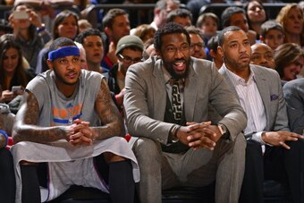 NEW YORK - JANUARY 24:   Carmelo Anthony #7 and Amar'e Stoudemire #1 of the New York Knicks sit on the bench during the game against the Charlotte Bobcats on January 24, 2014 at Madison Square Garden in New York City. NOTE TO USER: User expressly acknowle