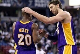 Dec 6, 2013; Sacramento, CA, USA; Los Angeles Lakers center Pau Gasol (16) celebrates with shooting guard Jodie Meeks (20) as the clock runs out against the Sacramento Kings during the fourth quarter at Sleep Train Arena. The Los Angeles Lakers defeated t