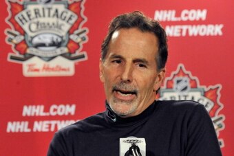 VANCOUVER, CANADA - MARCH 2: (EDITORIAL USE ONLY) John Tortorella the Coach of the Vancouver Canucks speaks to the press after the game at the 2014 Tim Hortons NHL Heritage Classic between the Vancouver Canucks and Ottawa Senators at BC Place on March 2, 