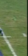 Brown uses his quickness to avoid two defenders on his way to a score.