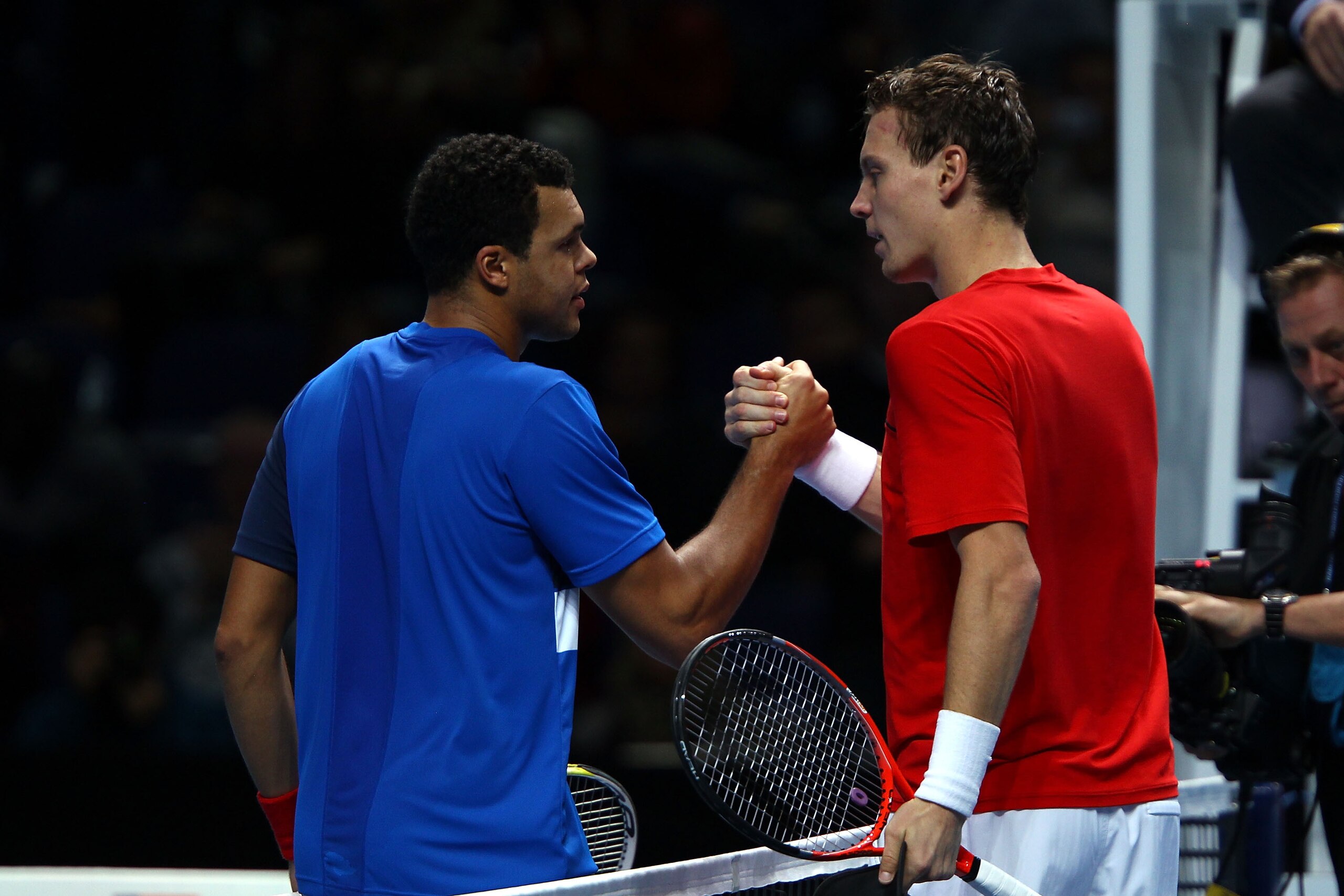 LONDON, ENGLAND - NOVEMBER 26: Jo-Wilfried Tsonga of France greets Tomas Berdych of Czech Republic after men's singles semi-final match during the Barclays ATP World Tour Finals at the O2 Arena on November 26, 2011 in London, England. Tsonga won 6-3 7-5 LONDON, ENGLAND - NOVEMBER 26: Jo-Wilfried Tsonga of France greets Tomas Berdych of Czech Republic after men's singles semi-final match during the Barclays ATP World Tour Finals at the O2 Arena on November 26, 2011 in London, England. Tsonga won 6-3 7-5