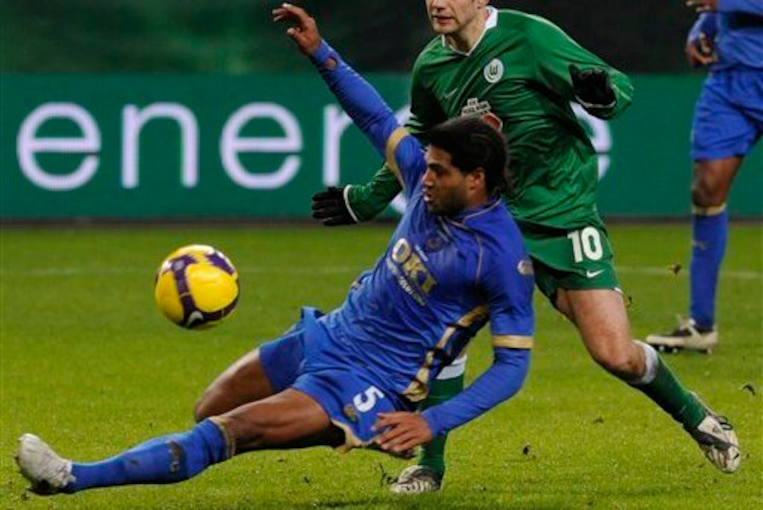 Johnson in UEFA Cup action for Portsmouth after sealing two-year permanent switch.