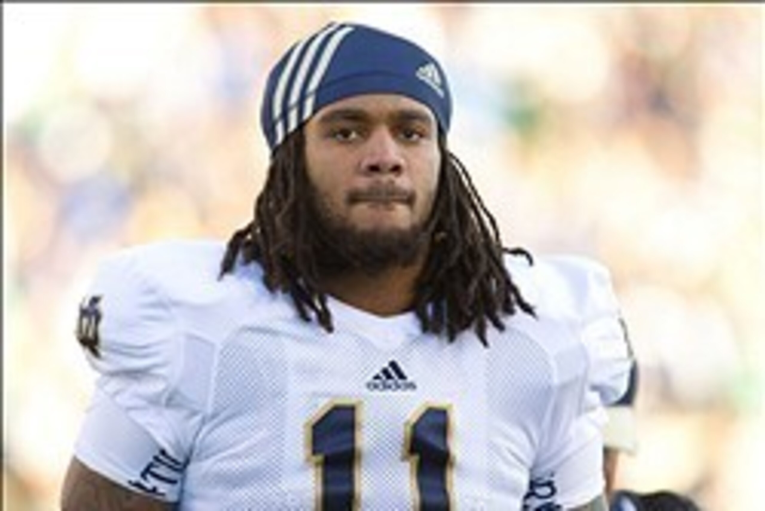 Oct 26, 2013; Colorado Springs, CO, USA; Notre Dame Fighting Irish linebacker Ishaq Williams (11) walks to the locker room at halftime of the game against the Air Force Falcons at Falcon Stadium. Notre Dame won 45-10. Mandatory Credit: Matt Cashore-USA TO