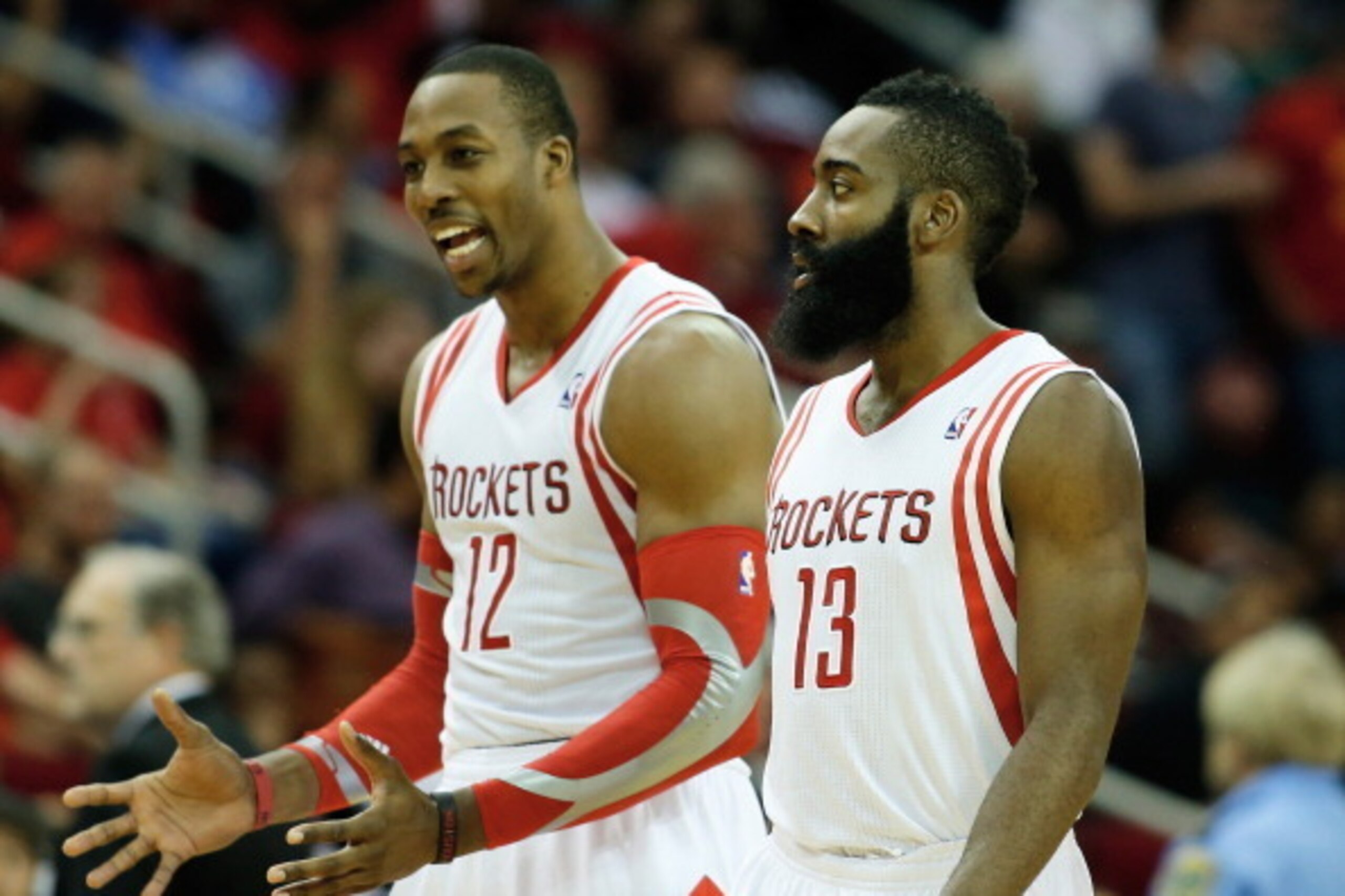 HOUSTON, TX - NOVEMBER 11: Dwight Howard #12 and James Harden #13 of the Houston Rockets walk off the court during the game against the Toronto Raptors at Toyota Center on November 11, 2013 in Houston, Texas. NOTE TO USER: User expressly acknowledges and HOUSTON, TX - NOVEMBER 11: Dwight Howard #12 and James Harden #13 of the Houston Rockets walk off the court during the game against the Toronto Raptors at Toyota Center on November 11, 2013 in Houston, Texas. NOTE TO USER: User expressly acknowledges and