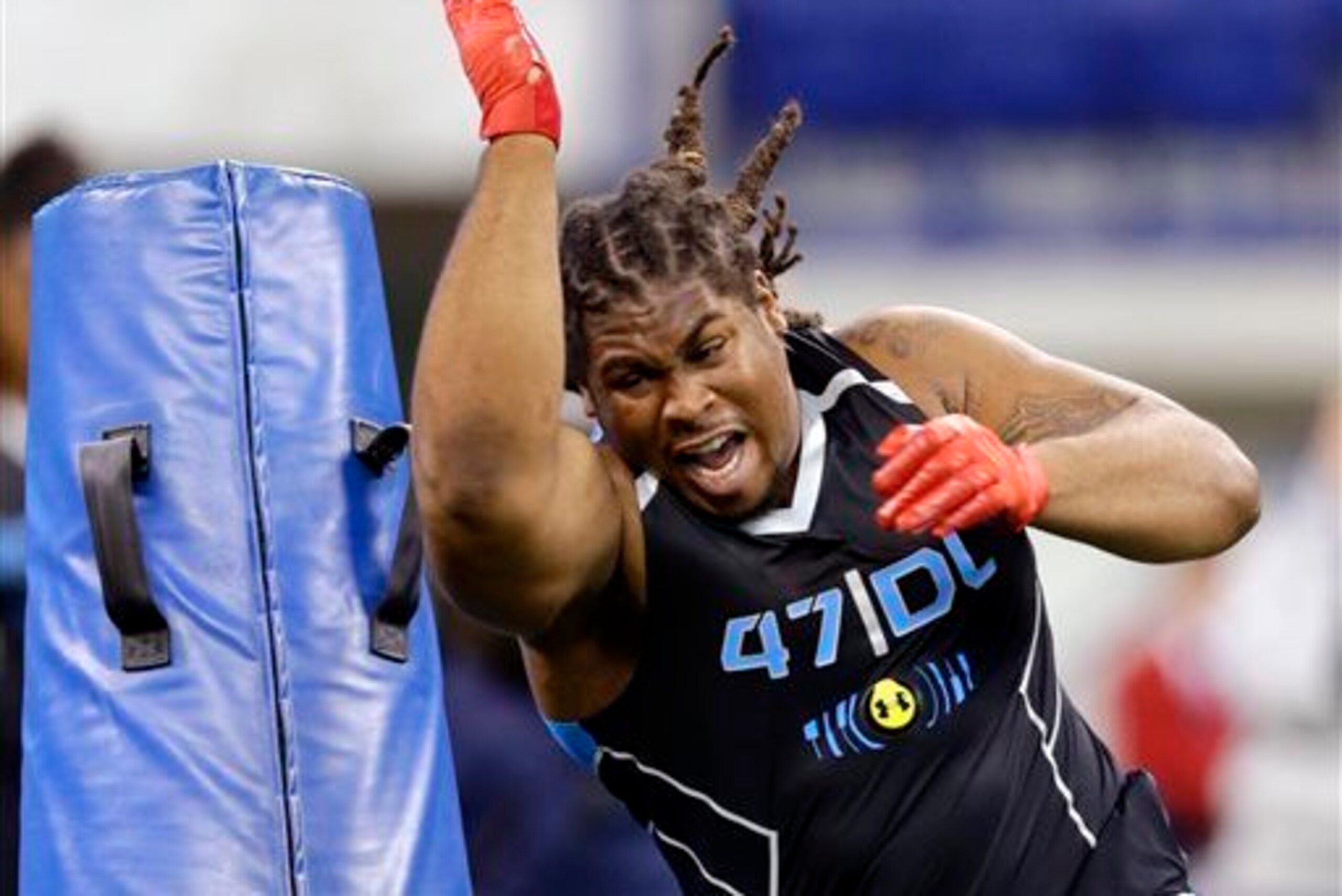 Arizona State defensive lineman Will Sutton runs a drill at the NFL football scouting combine in Indianapolis, Monday, Feb. 24, 2014. (AP Photo/Michael Conroy)