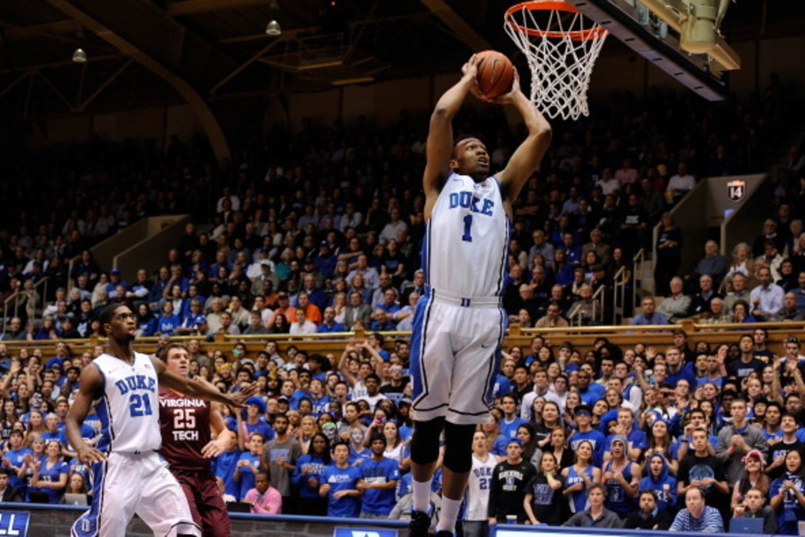 DURHAM, NC - FEBRUARY 25:  Jabari Parker #1 of the Duke Blue Devils converts a steal into a dunk against the Virginia Tech Hokies during a game at Cameron Indoor Stadium on February 25, 2014 in Durham, North Carolina.  (Photo by Grant Halverson/Getty Imag