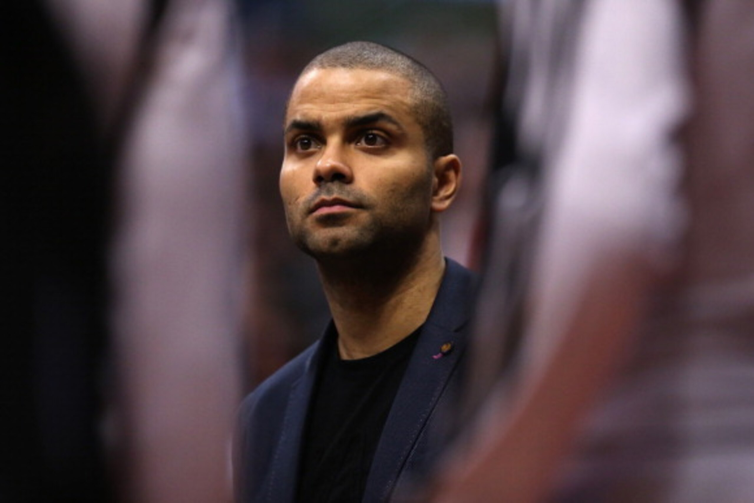 LOS ANGELES, CA - FEBRUARY 18:  Tony Parker of the San Antonio Spurs looks on from the bench against the Los Angeles Clippers in the first half at Staples Center on February 18, 2014 in Los Angeles, California. NOTE TO USER: User expressly acknowledges an