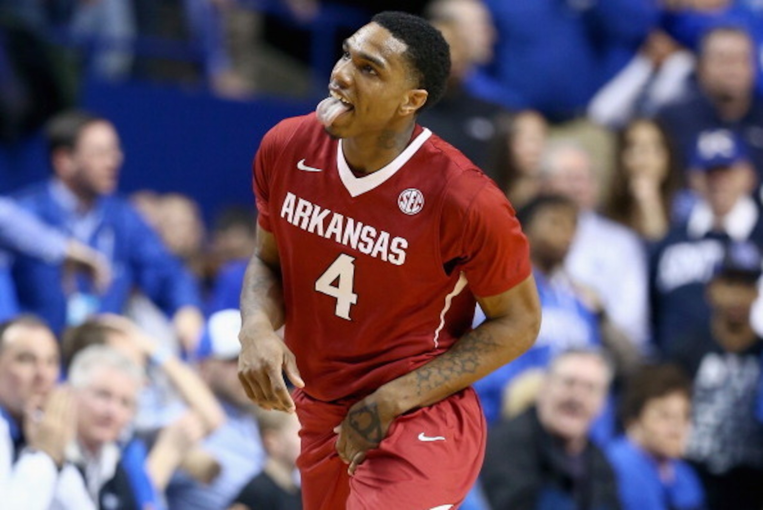 LEXINGTON, KY - FEBRUARY 27:  Coty Clarke #4 of the Arkansas Razorbacks celebrates during the game against the Kentucky Wildcats at Rupp Arena on February 27, 2014 in Lexington, Kentucky.  (Photo by Andy Lyons/Getty Images)