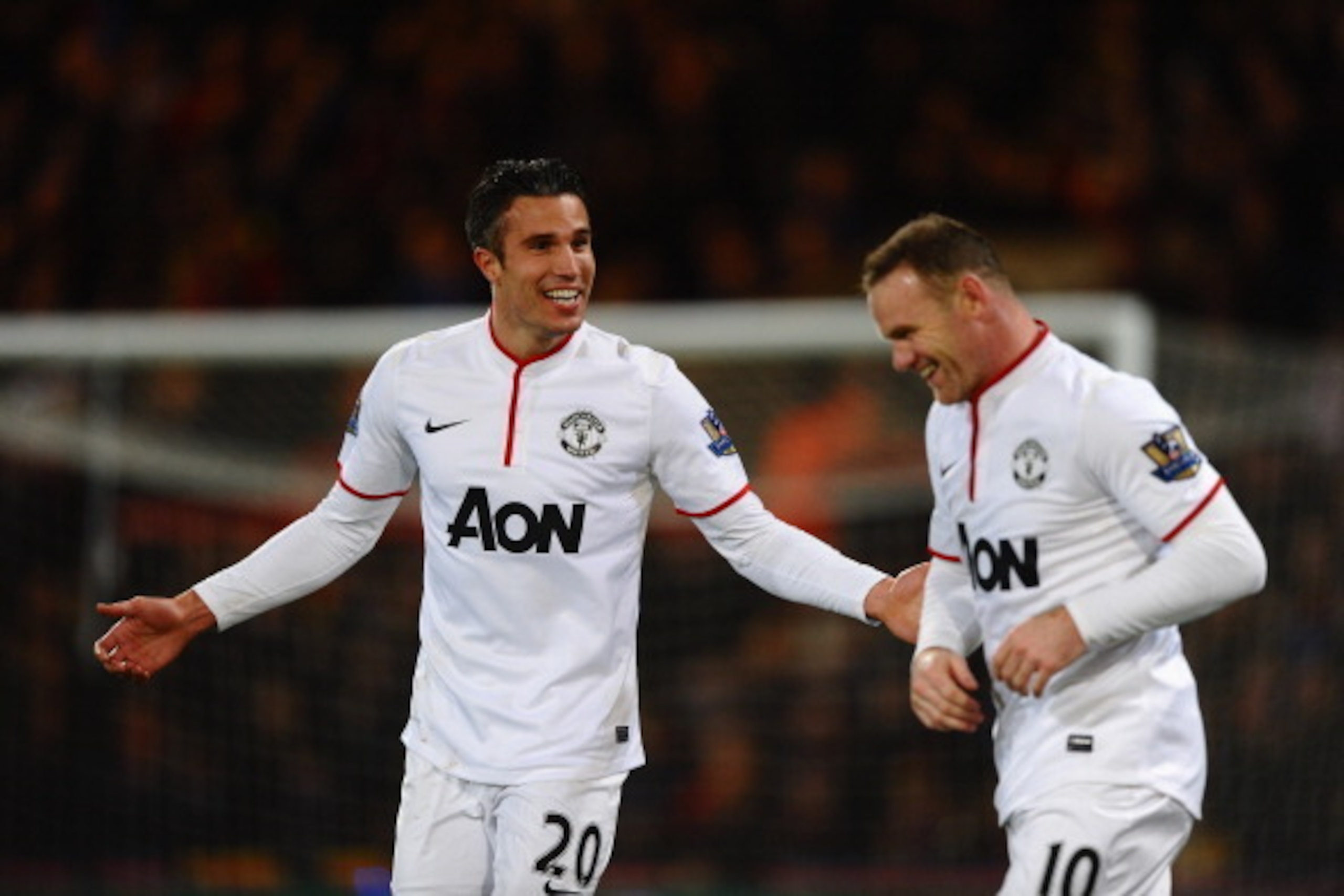 LONDON, ENGLAND - FEBRUARY 22: Robin Van Persie of Manchester United celebrates the first goal with Wayne Rooney during the Barclays Premier League match between Crystal Palace and Manchester United at Selhurst Park on February 22, 2014 in London, Englan LONDON, ENGLAND - FEBRUARY 22: Robin Van Persie of Manchester United celebrates the first goal with Wayne Rooney during the Barclays Premier League match between Crystal Palace and Manchester United at Selhurst Park on February 22, 2014 in London, Englan