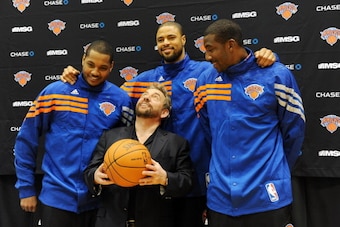 GREENBURGH, NY - DECEMBER 10: (L-R) Carmelo Anthony, Tyson Chandler, Amar'e Stoudemire of the New York Knicks and Executive Chairman of Madison Square Garden James Dolan during Chandler's introductory press conference on December 10, 2011 at The Knicks Tr