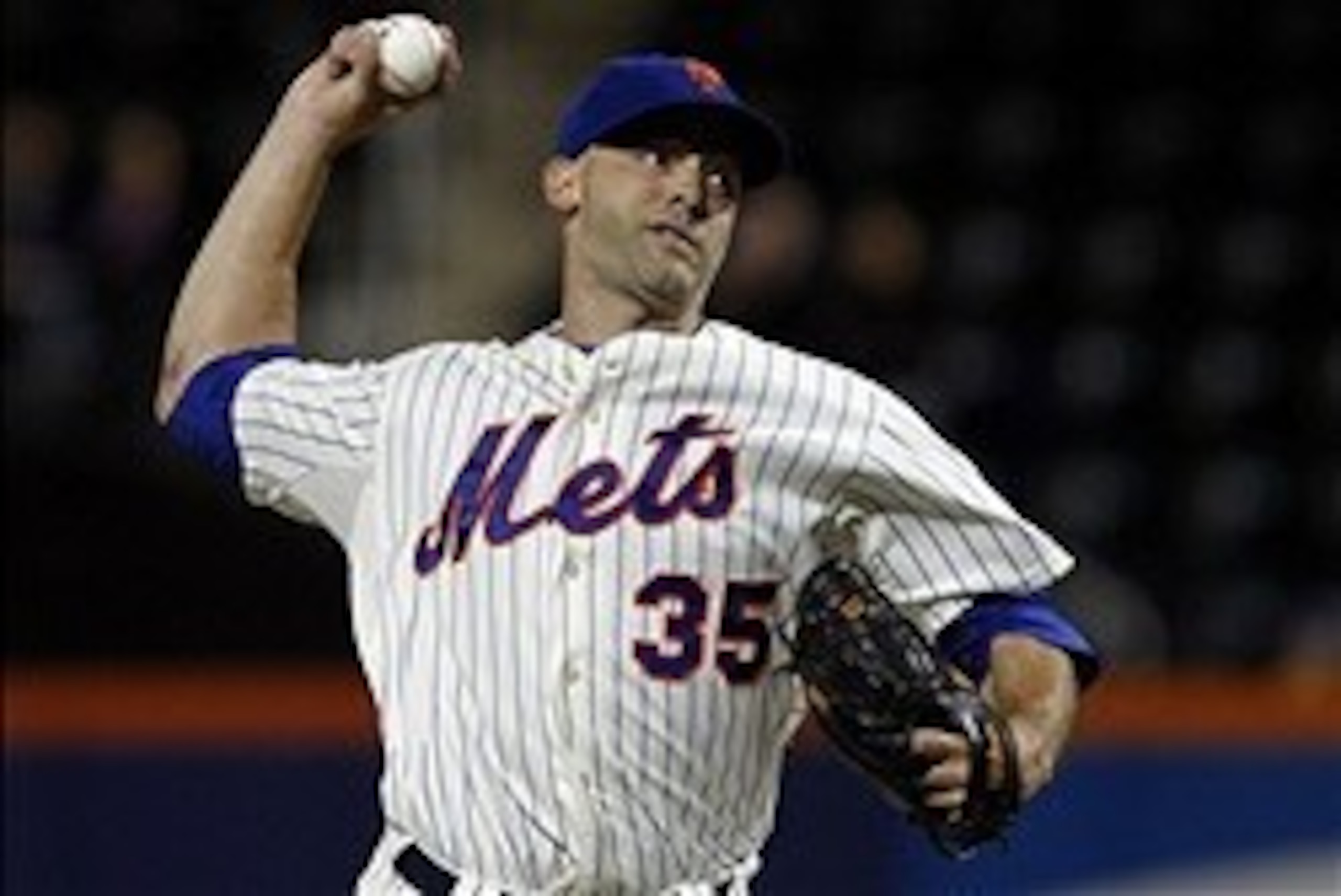 Sep 26, 2013; New York, NY, USA; New York Mets starting pitcher Dillon Gee (35) delivers a pitch in the first inning of against the Milwaukee Brewers at Citi Field. Mandatory Credit: Noah K. Murray-USA TODAY Sports
